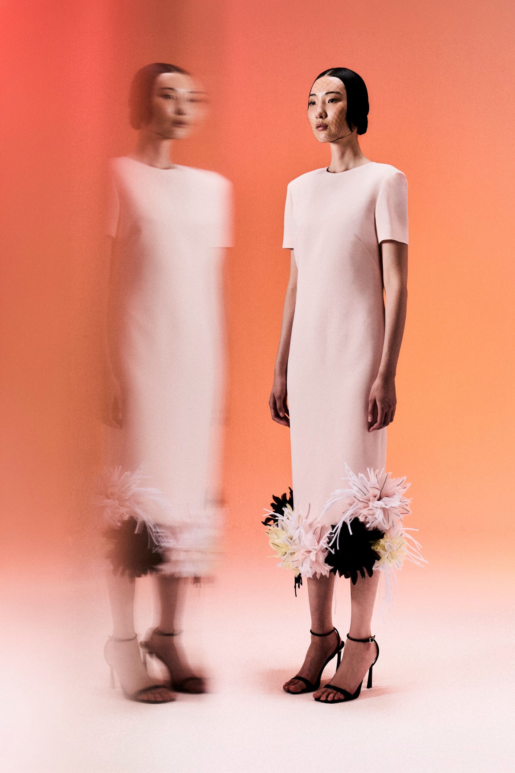 pale pink dress with floral hem