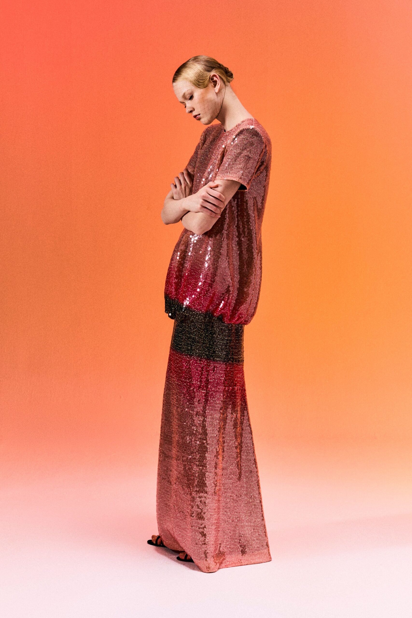 pink sequined color-block evening gown