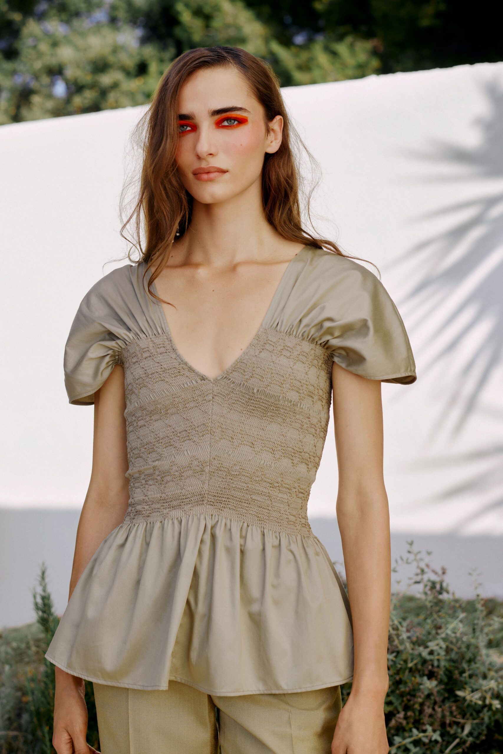 smocked peplum top