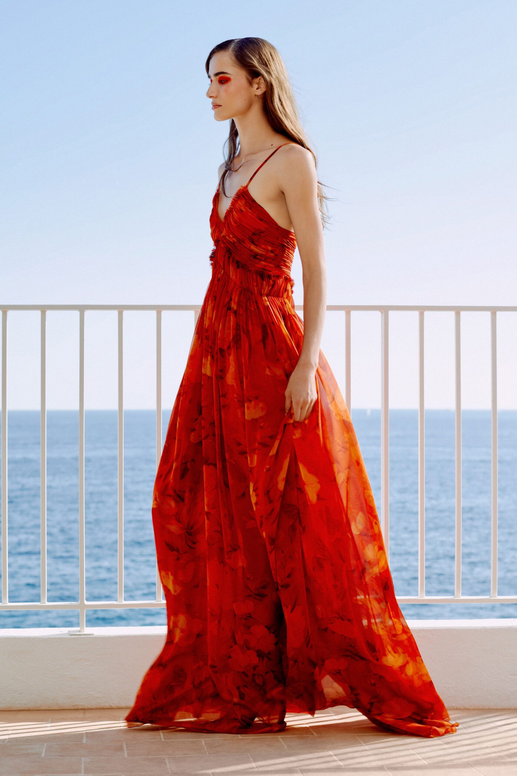 red floral chiffon evening gown