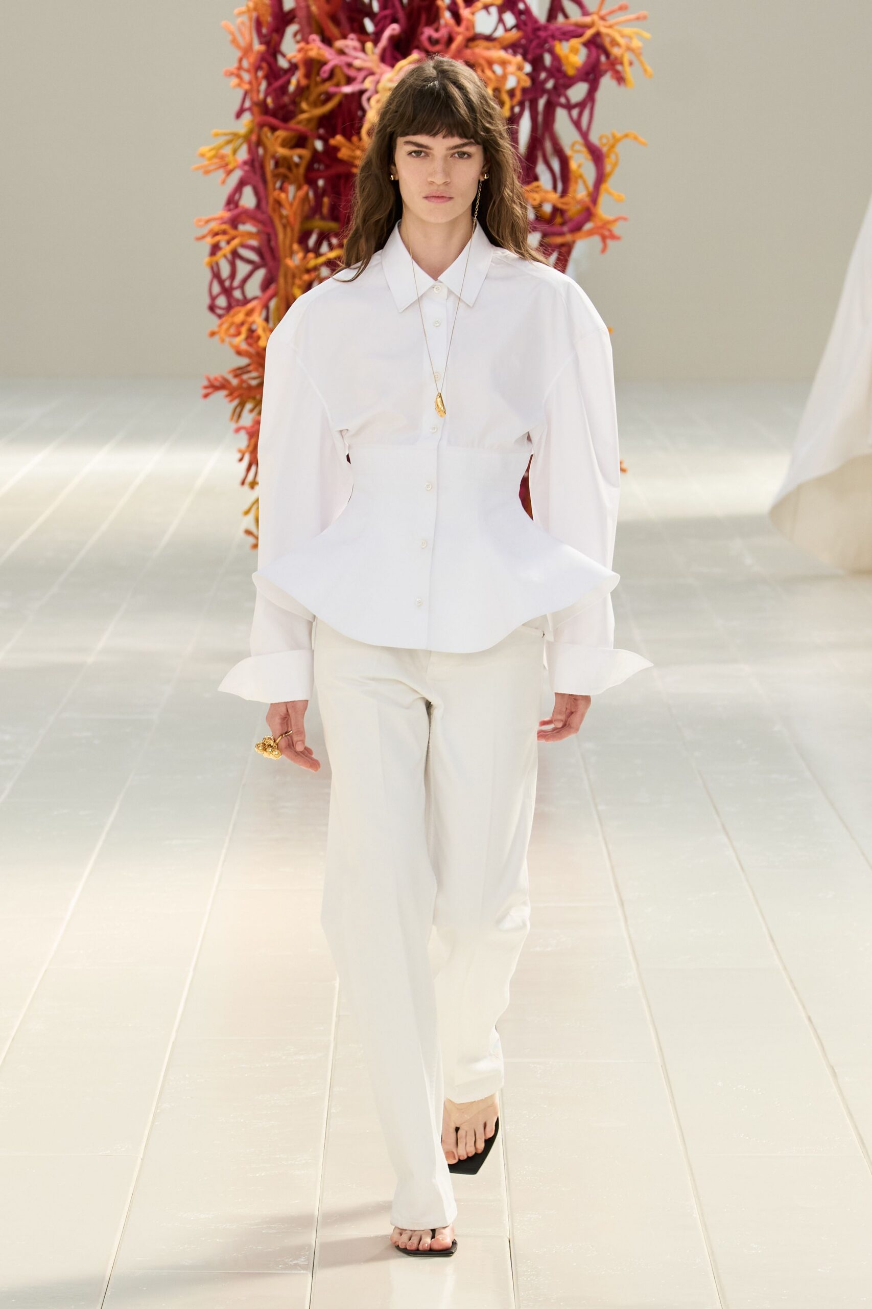 white peplum button-front shirt
