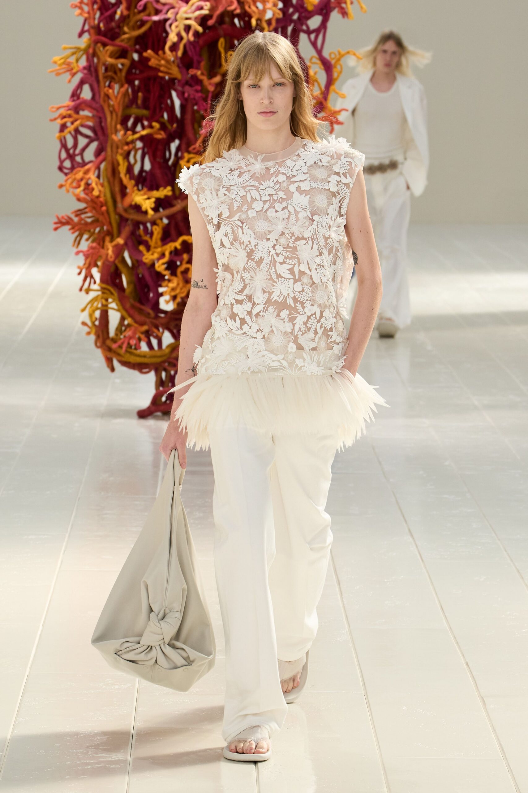 sheer floral appliqué feather-hem top