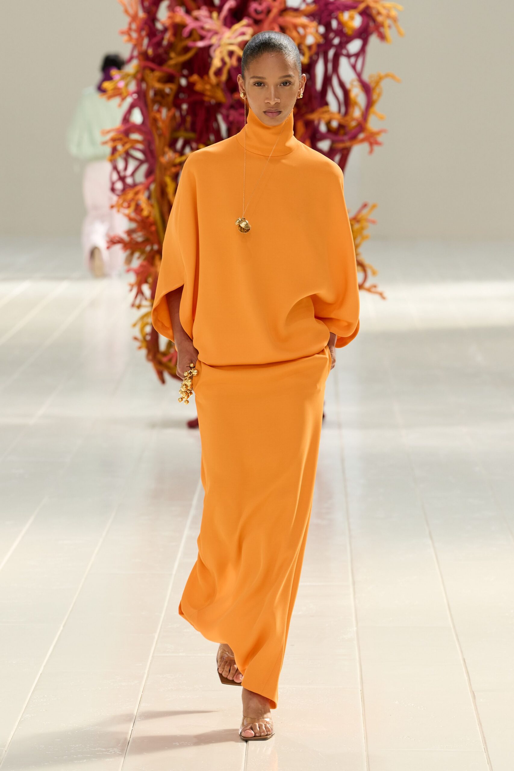 orange turtleneck draped column gown