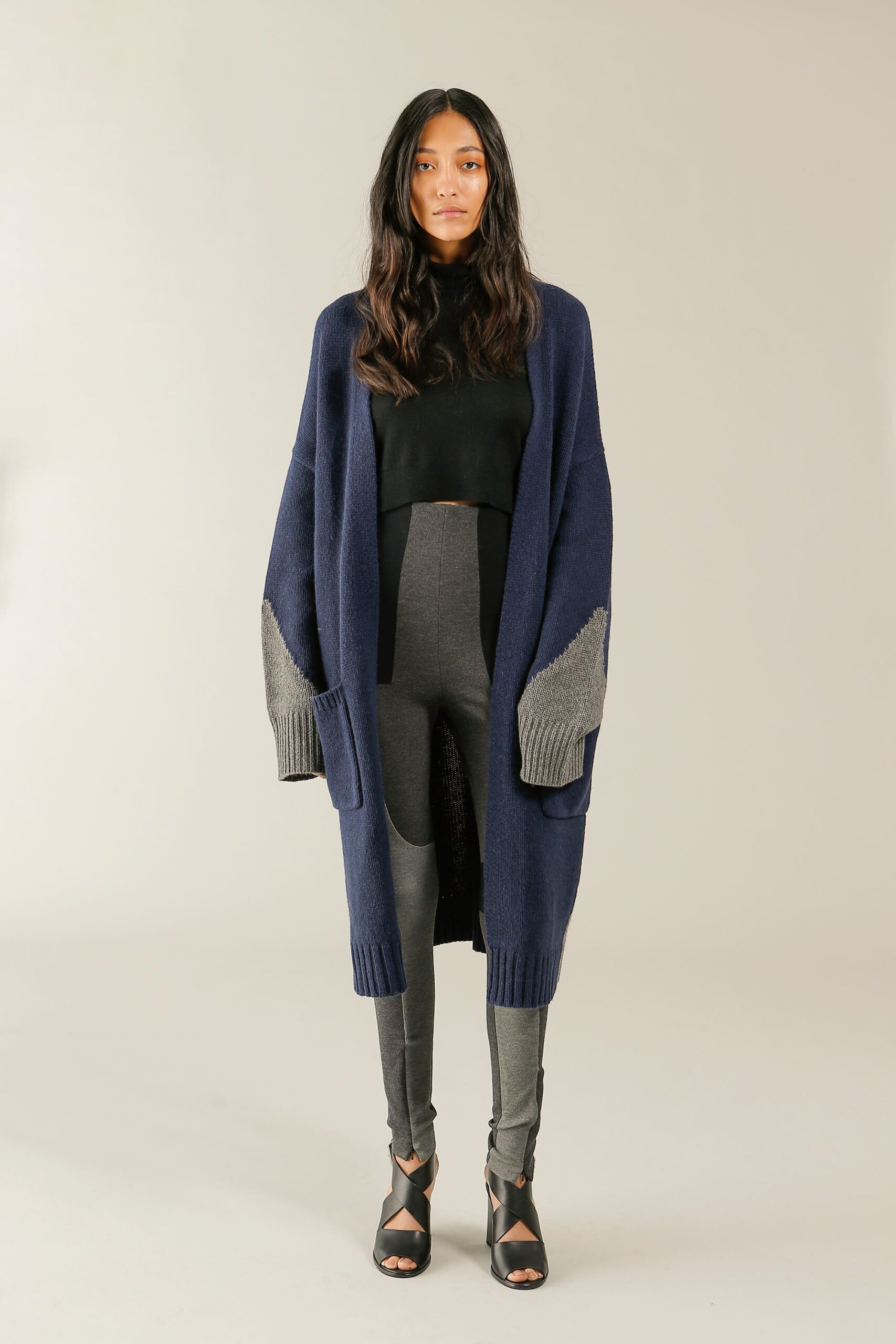 black knit sleeveless turtleneck cropped sweater