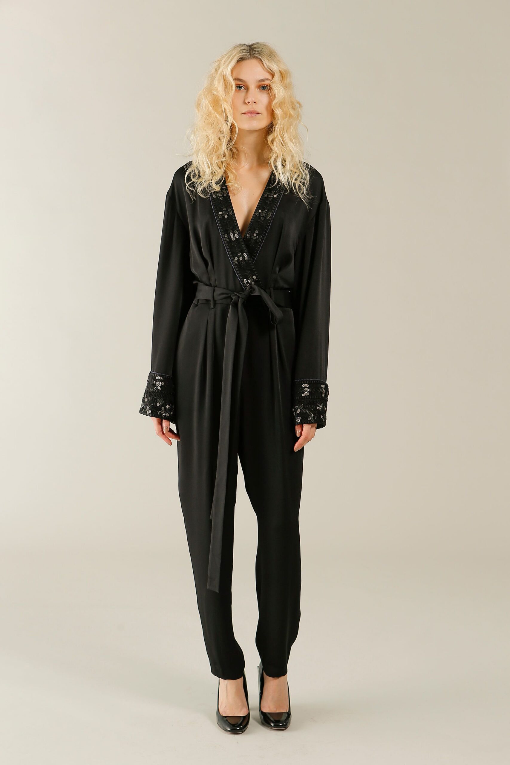 black sequin long-sleeve v-neck relaxed sequined belted jumpsuit