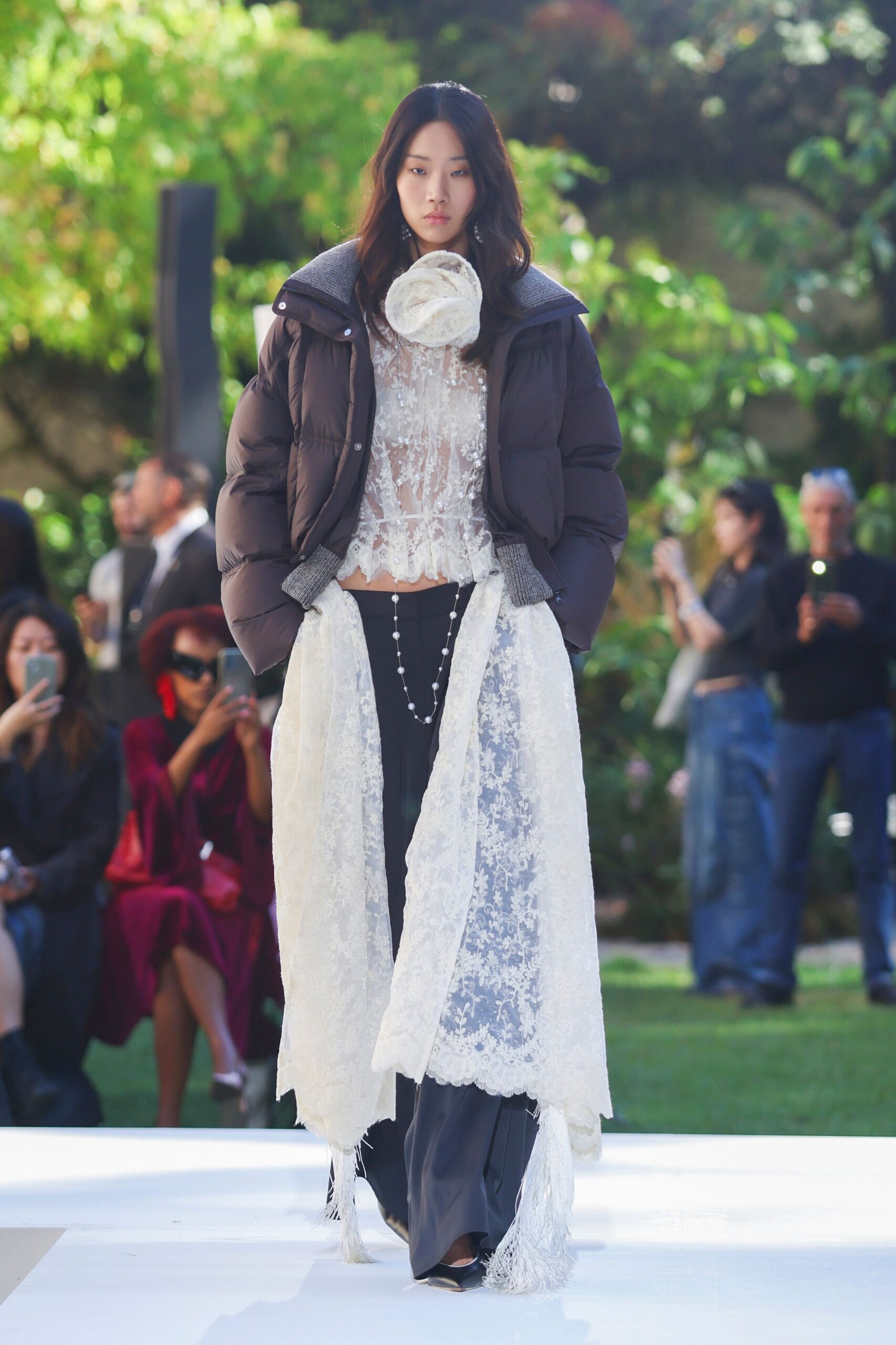 cropped puffer jacket over lace top