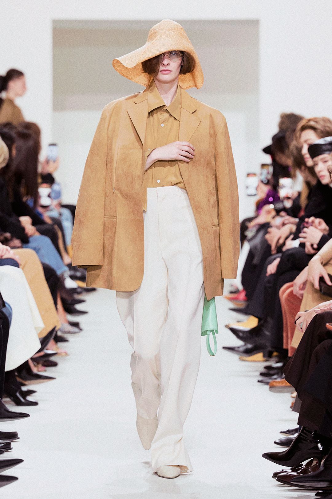 beige straw wide-brimmed hat