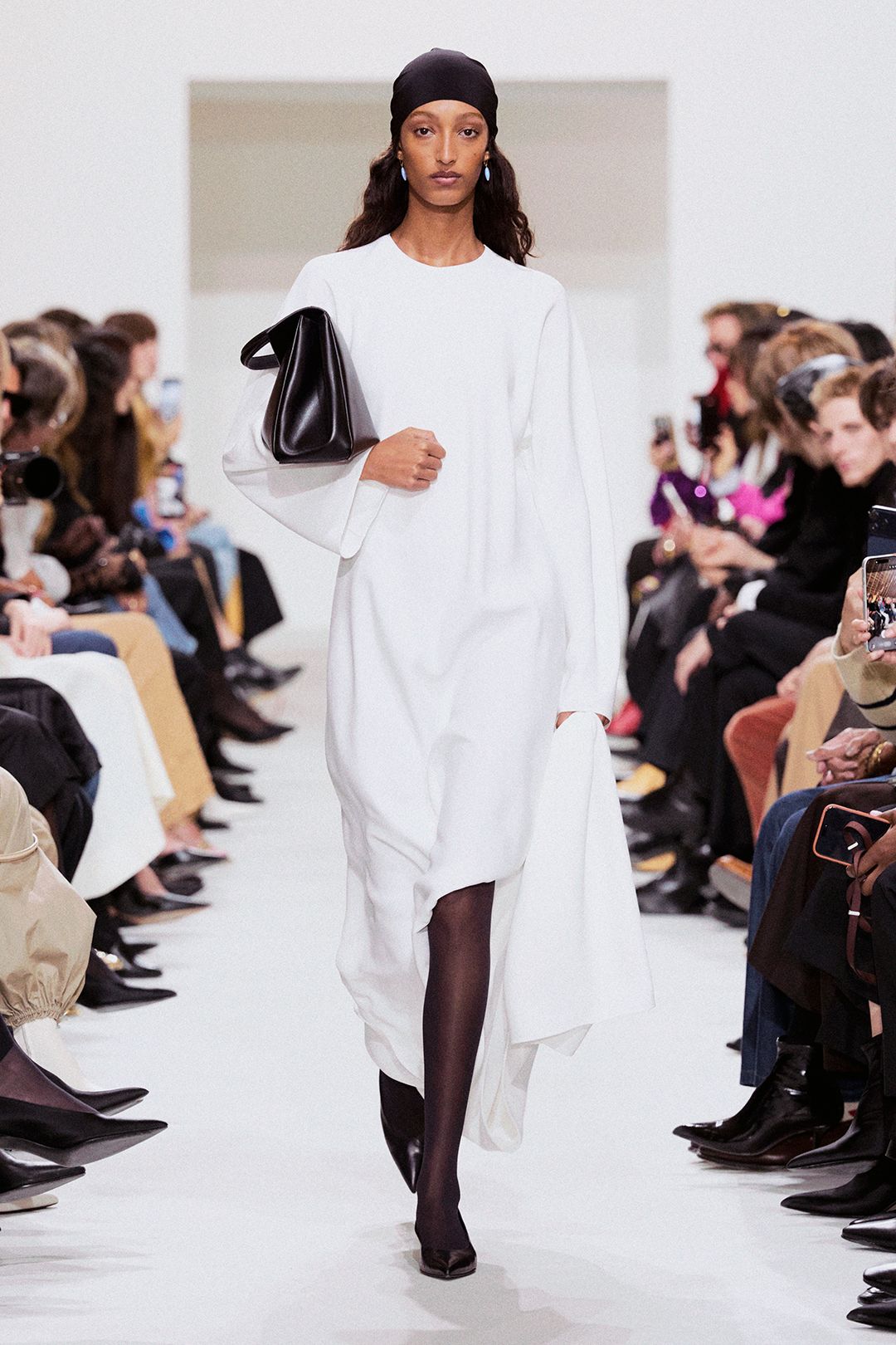 white draped caftan-style dress