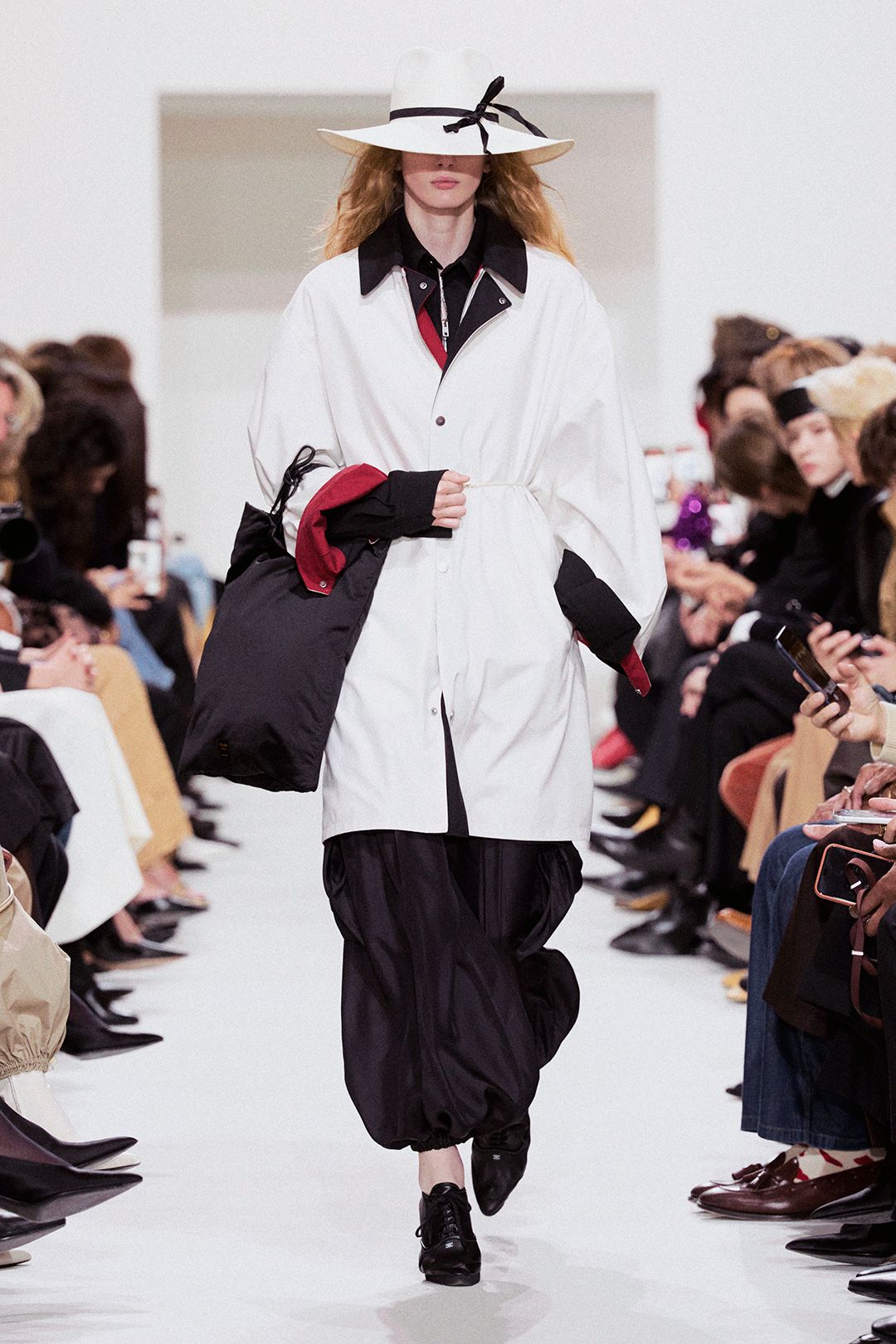 white wide-brimmed bow hat