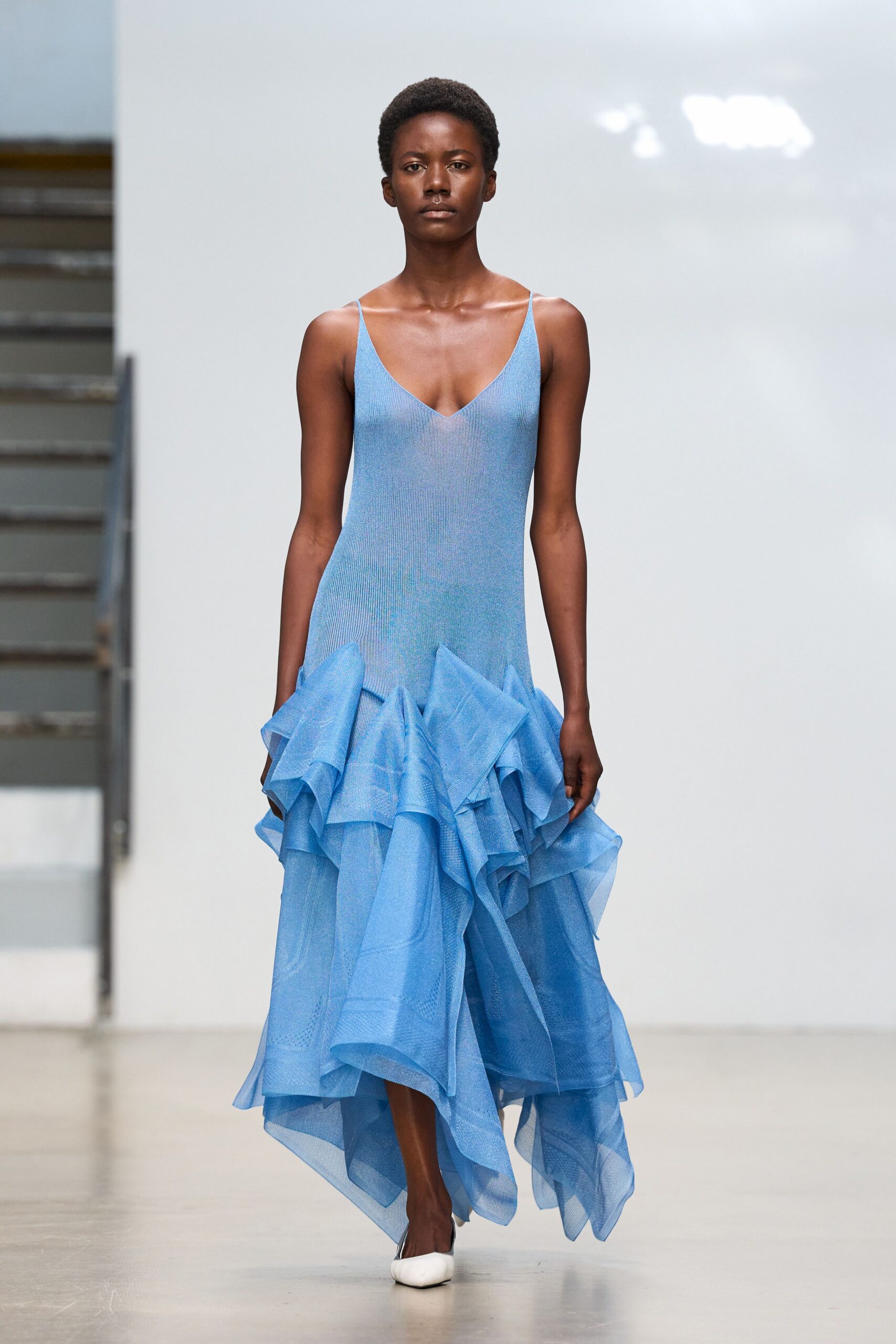 blue ruffled mermaid evening gown