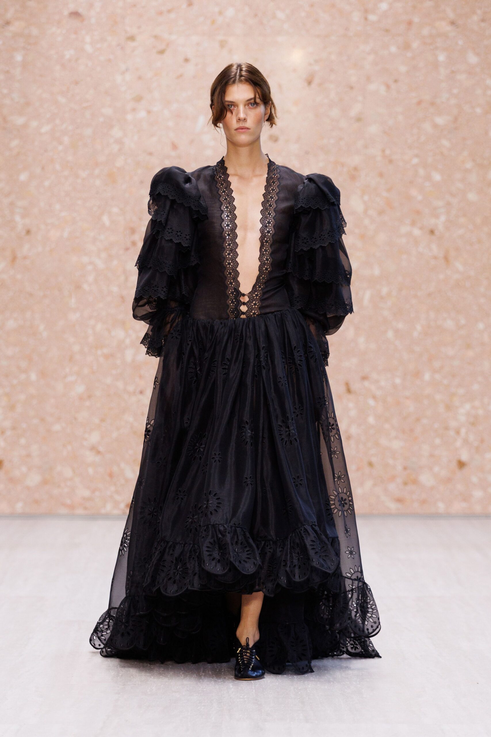 black tiered sheer evening gown
