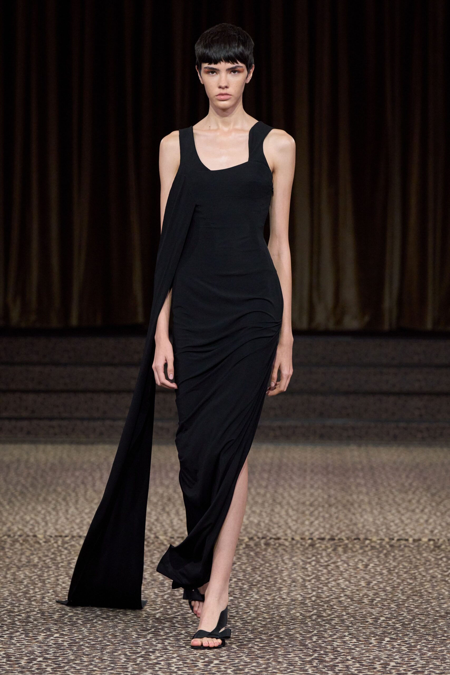 black one-shoulder draped evening gown