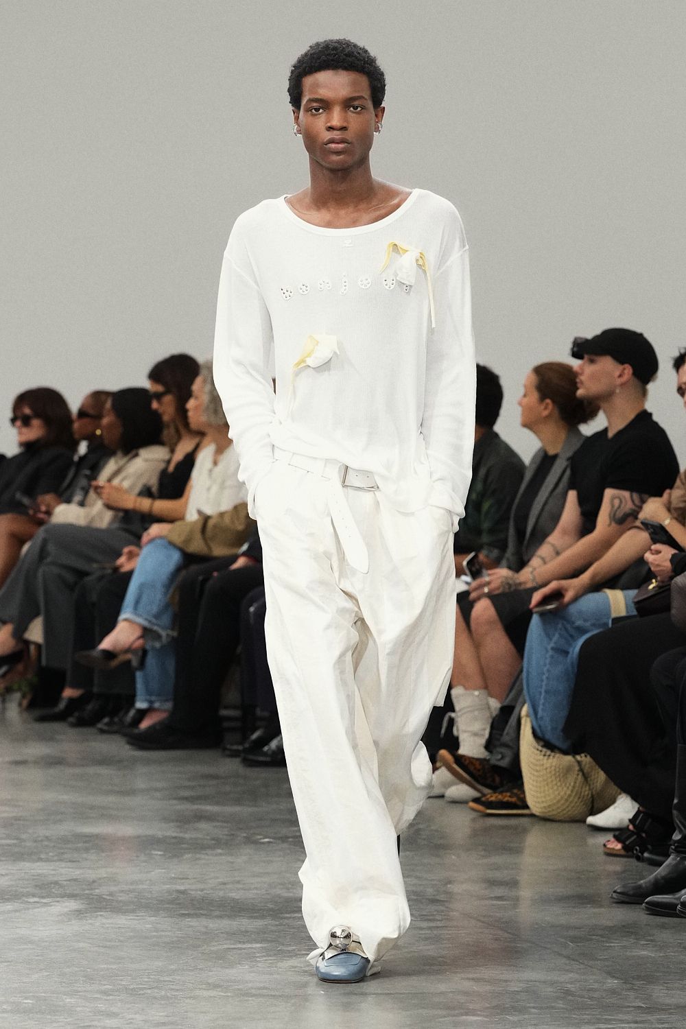 white appliqued knit sweater