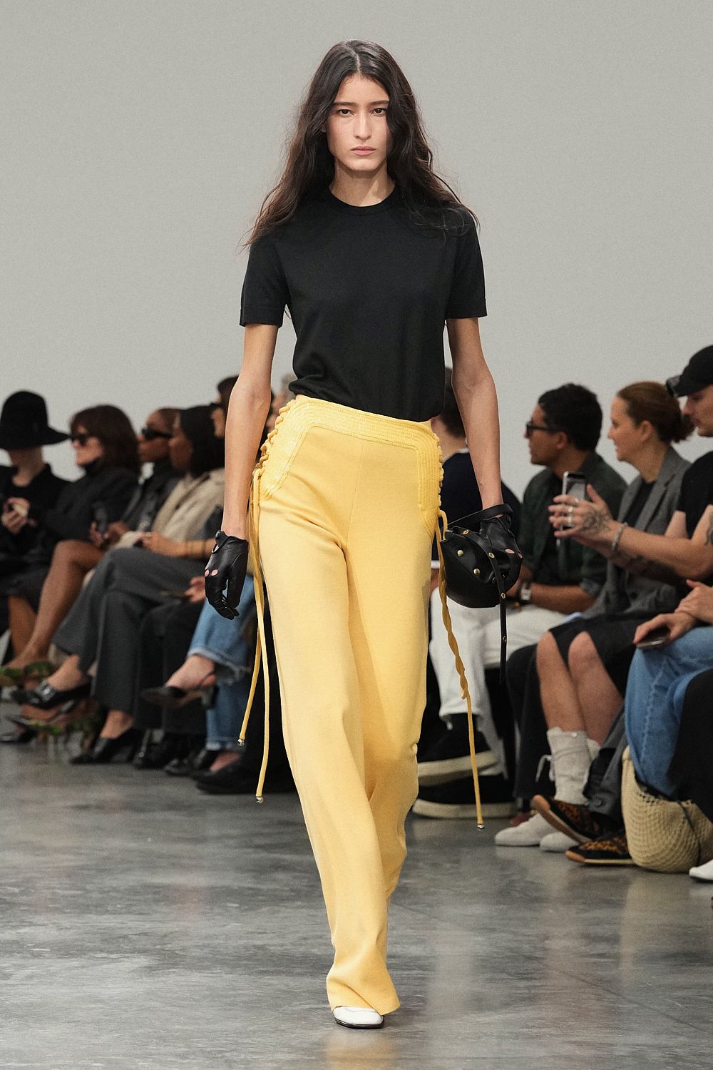 lace-up high-waisted yellow trousers