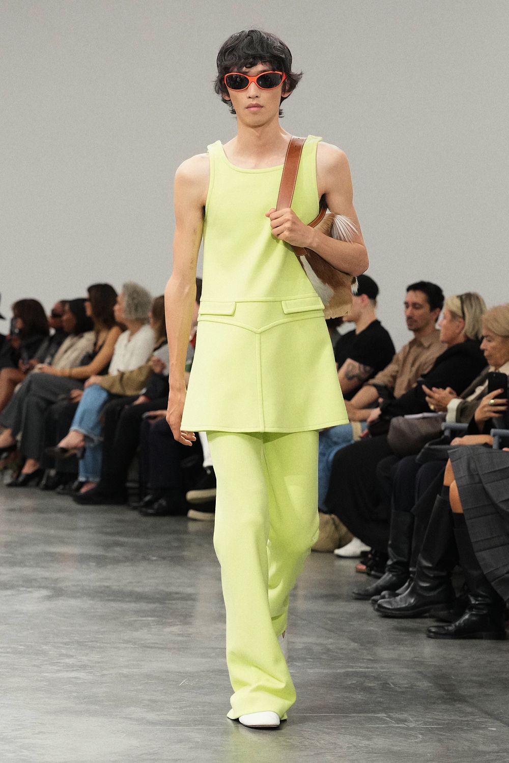 neon peplum top and wide-leg trousers