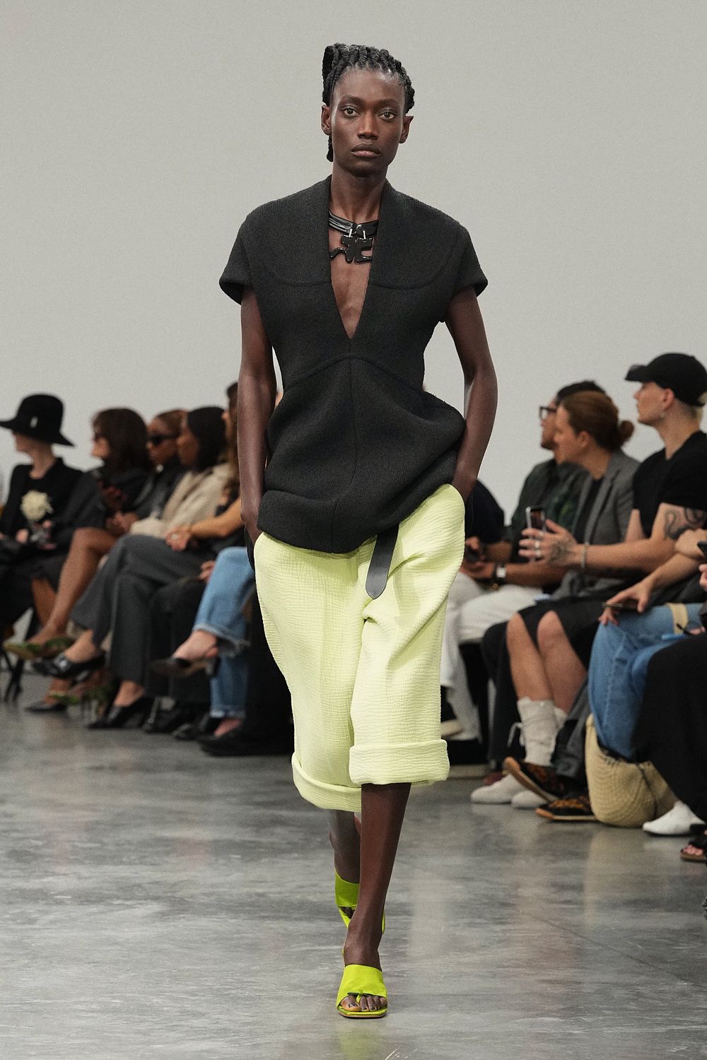 sculptural black peplum top