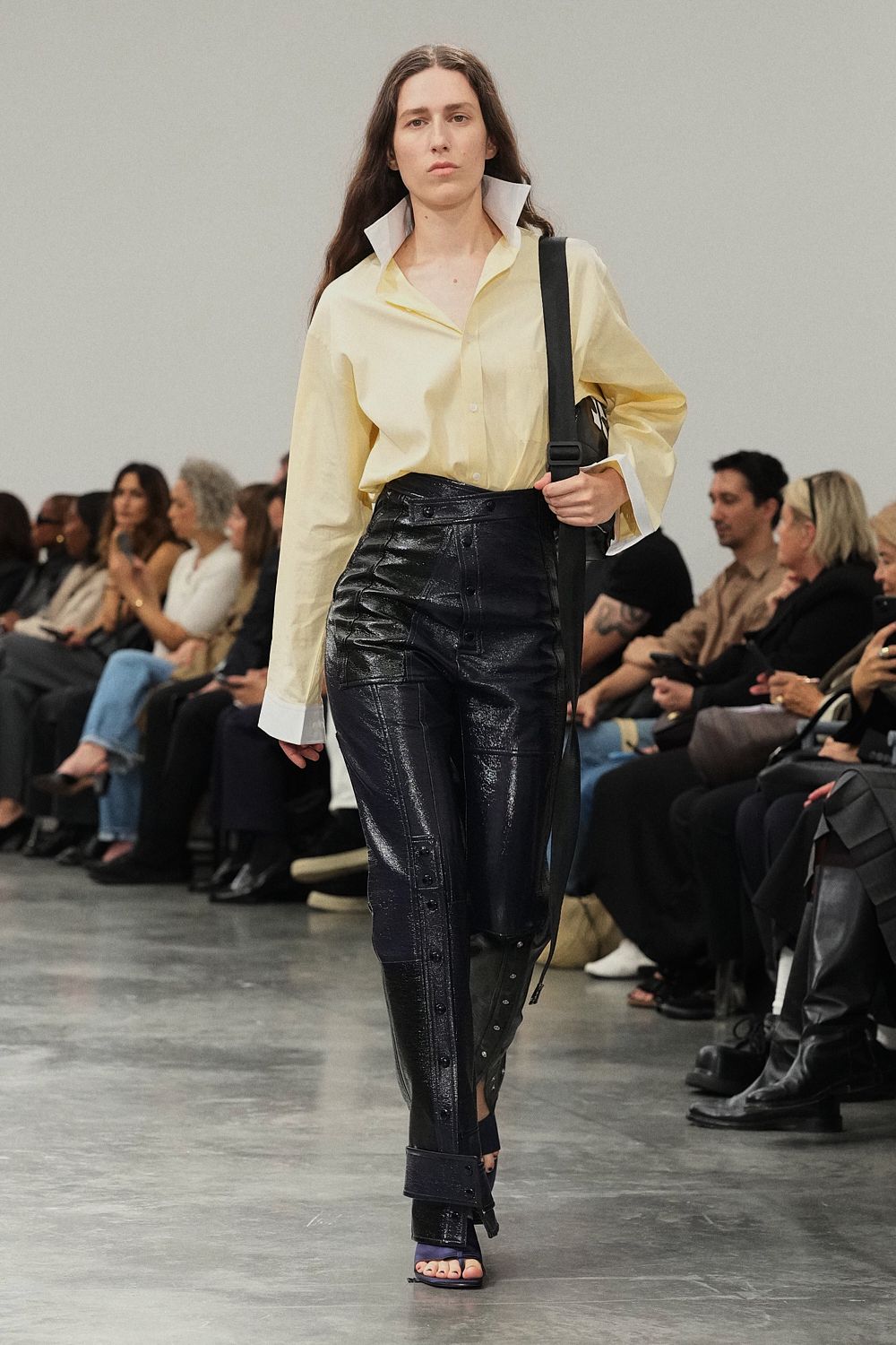 high-waisted black leather pants