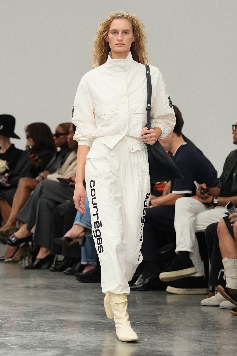 white utility jacket and logo track pants