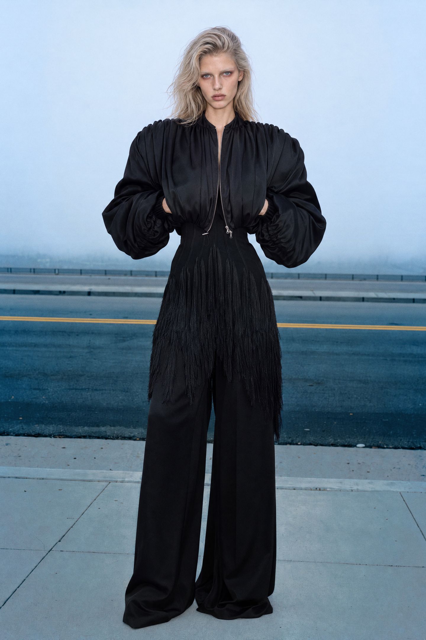 black fringed corset-waist jacket