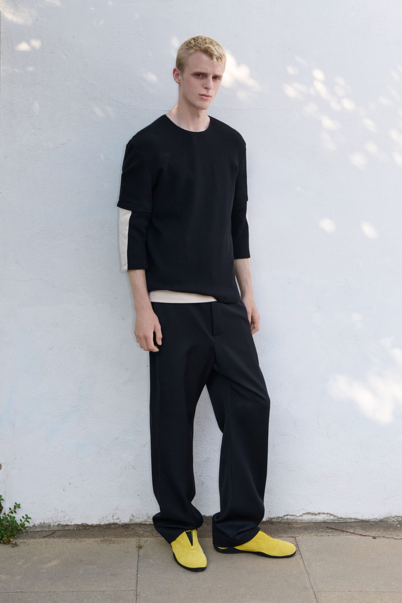 black knit high-neck short-sleeve relaxed layered textured top