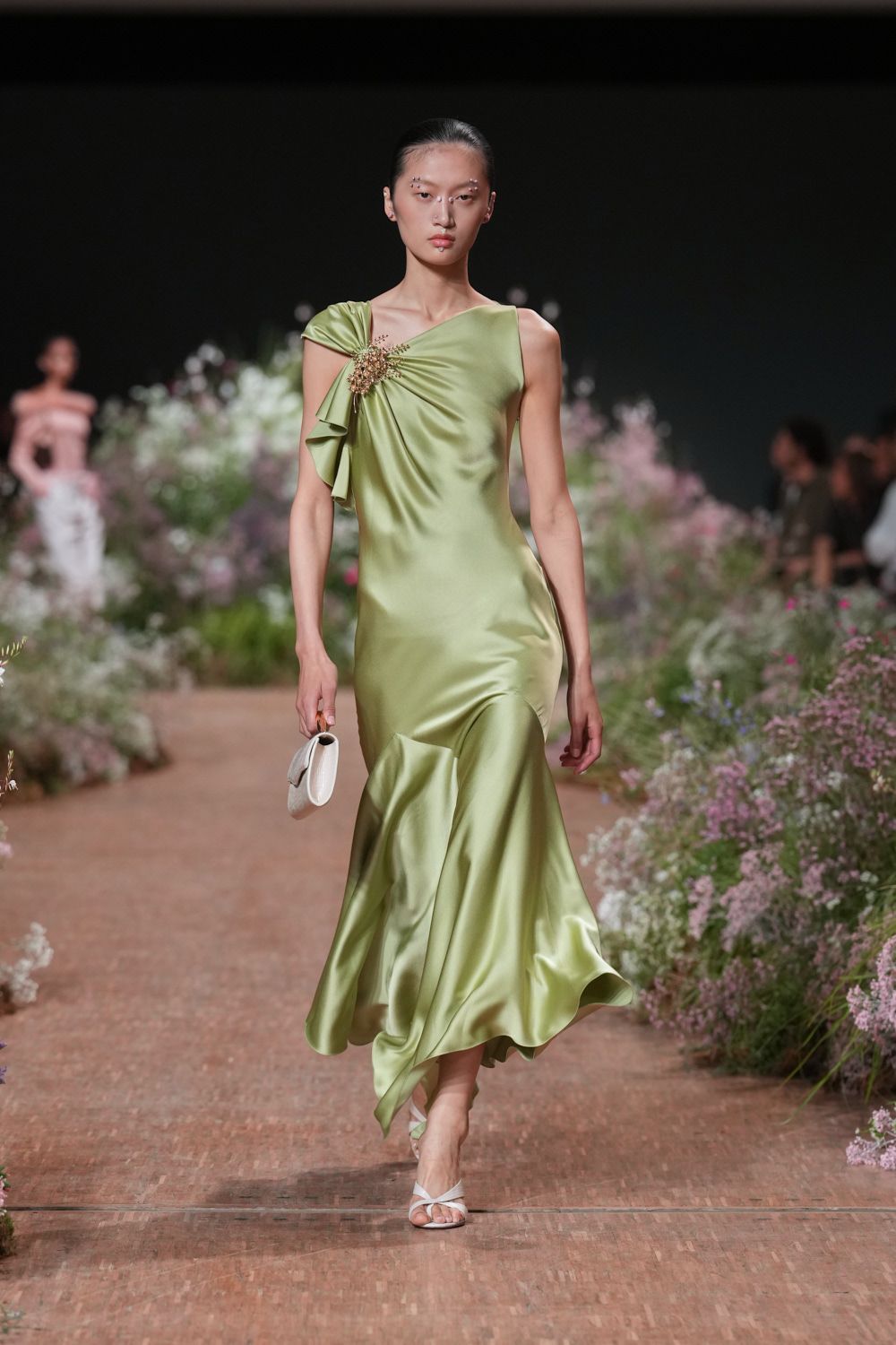 green satin asymmetric sleeveless fitted draped ruffled gown