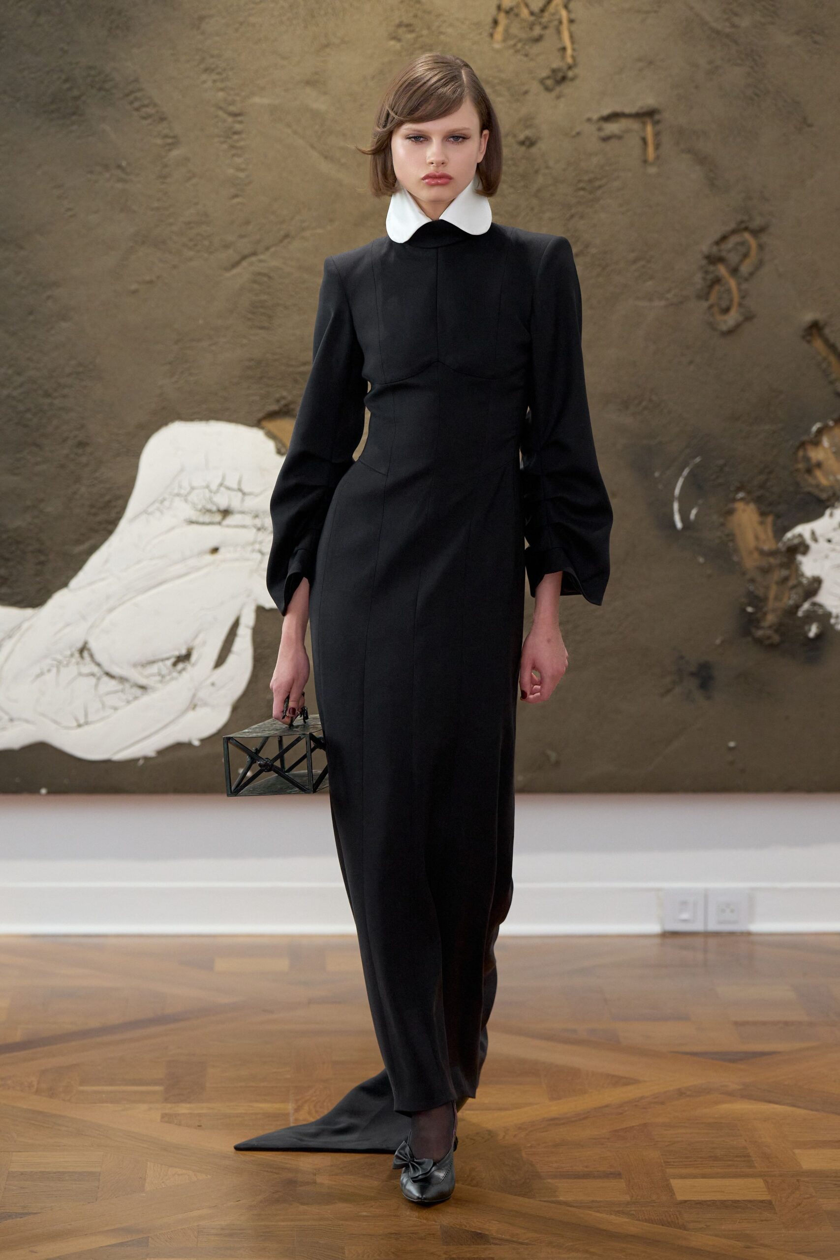 black column gown with white collar