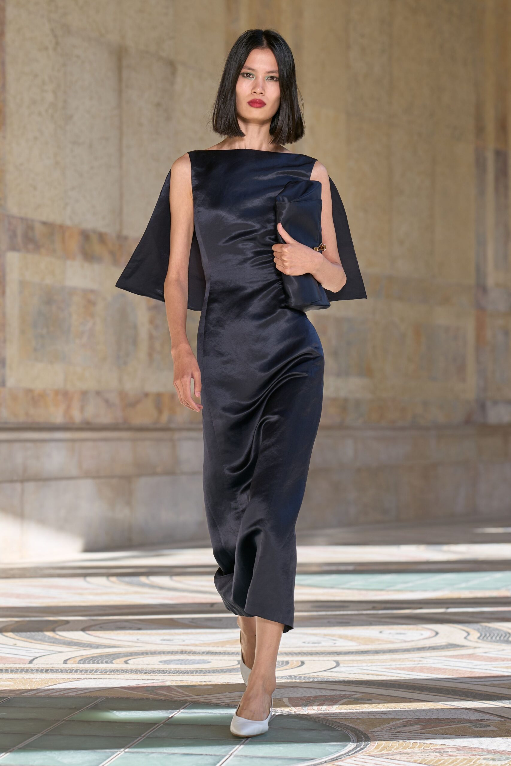 black satin cape-back evening gown