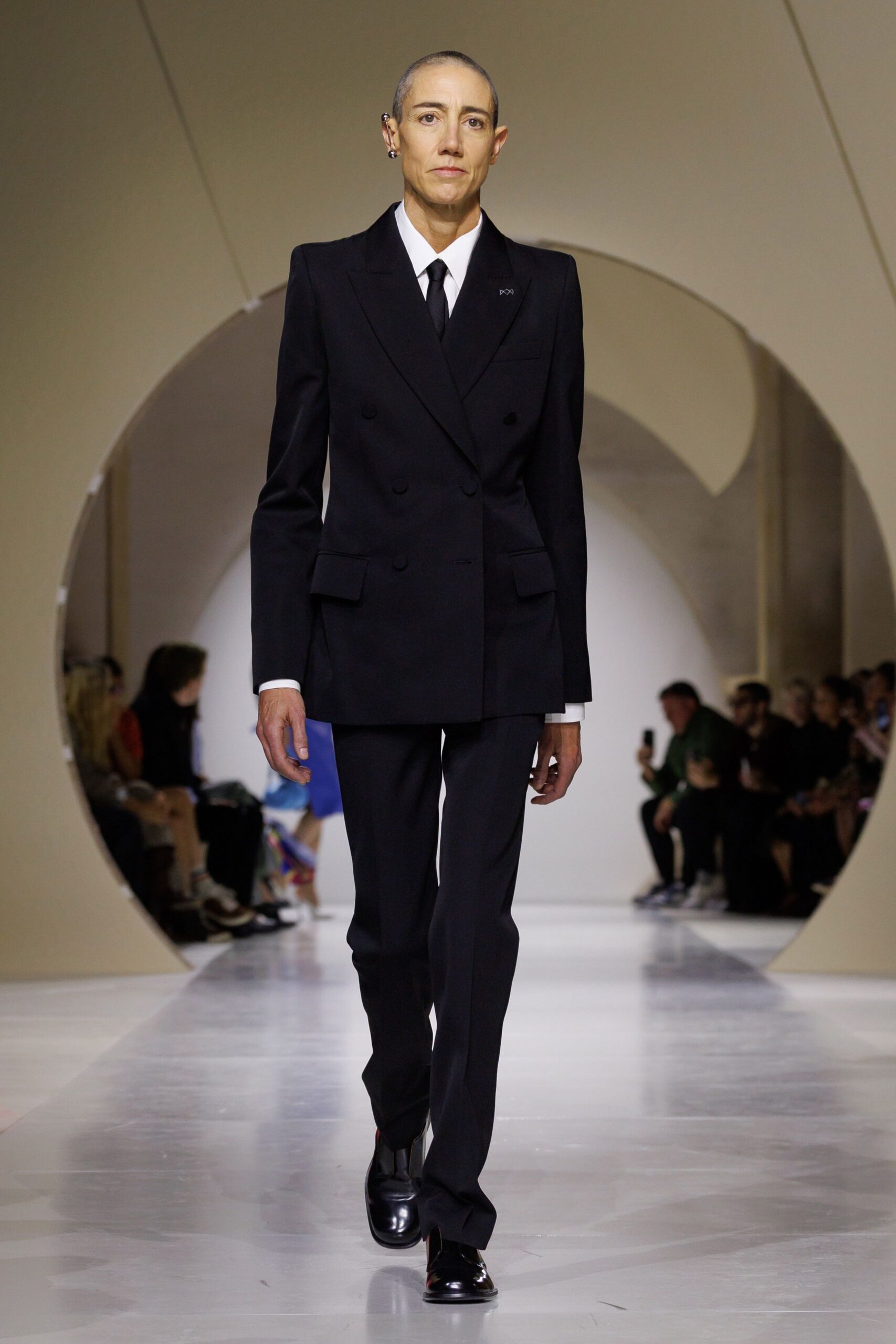 black elongated double-breasted tuxedo blazer
