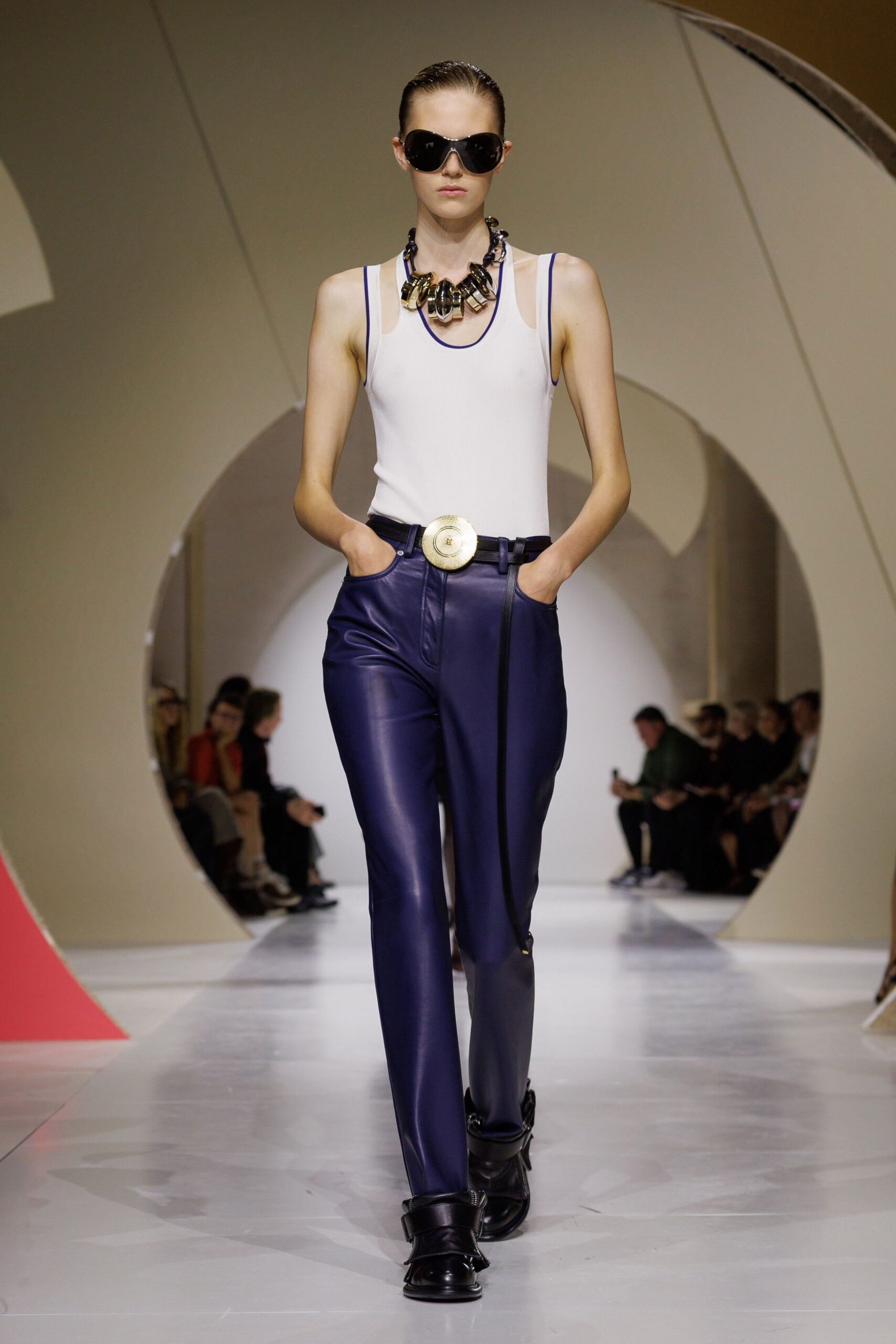 high-waisted blue leather pants