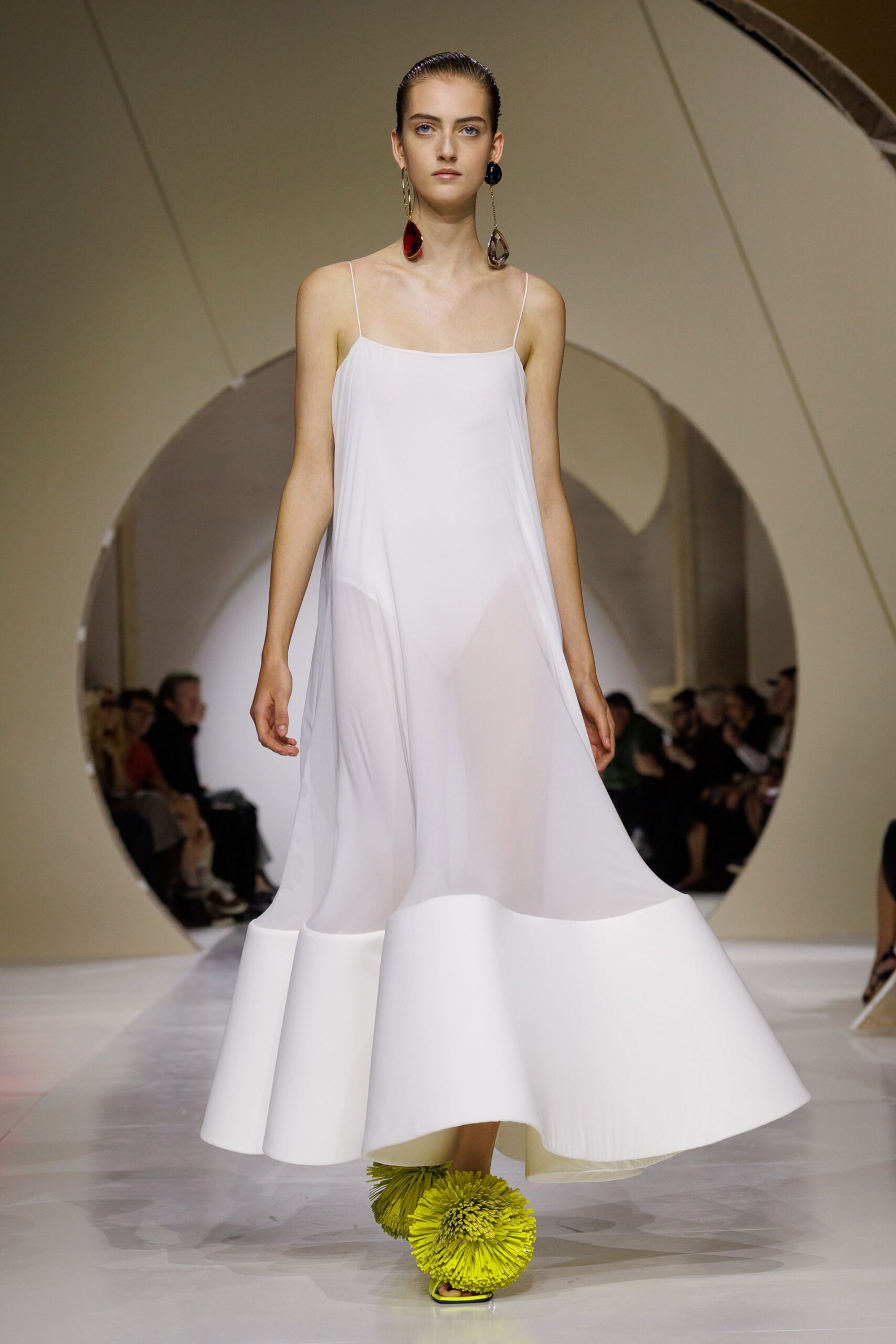 white flowing spaghetti-strap maxi dress