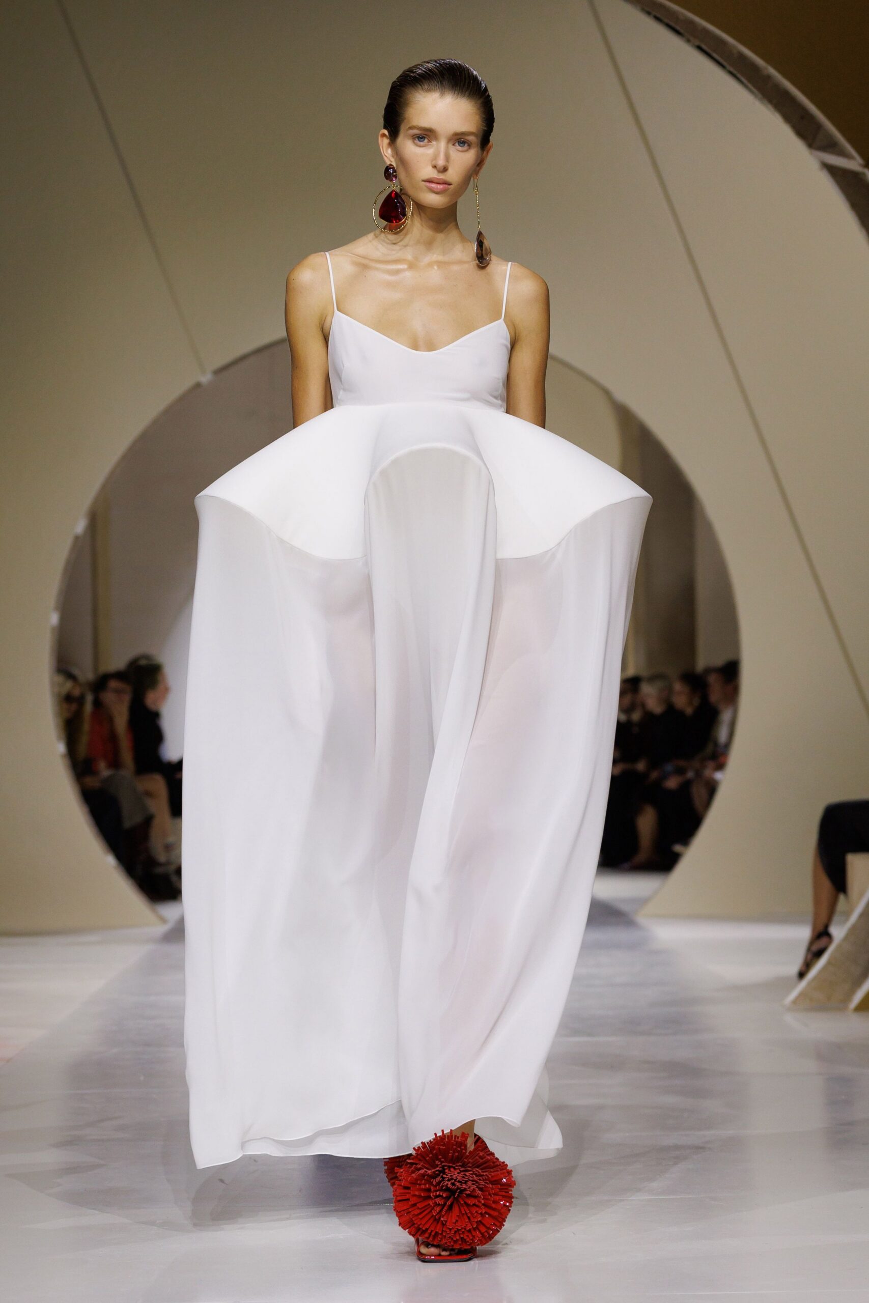 white sculptural pannier evening gown