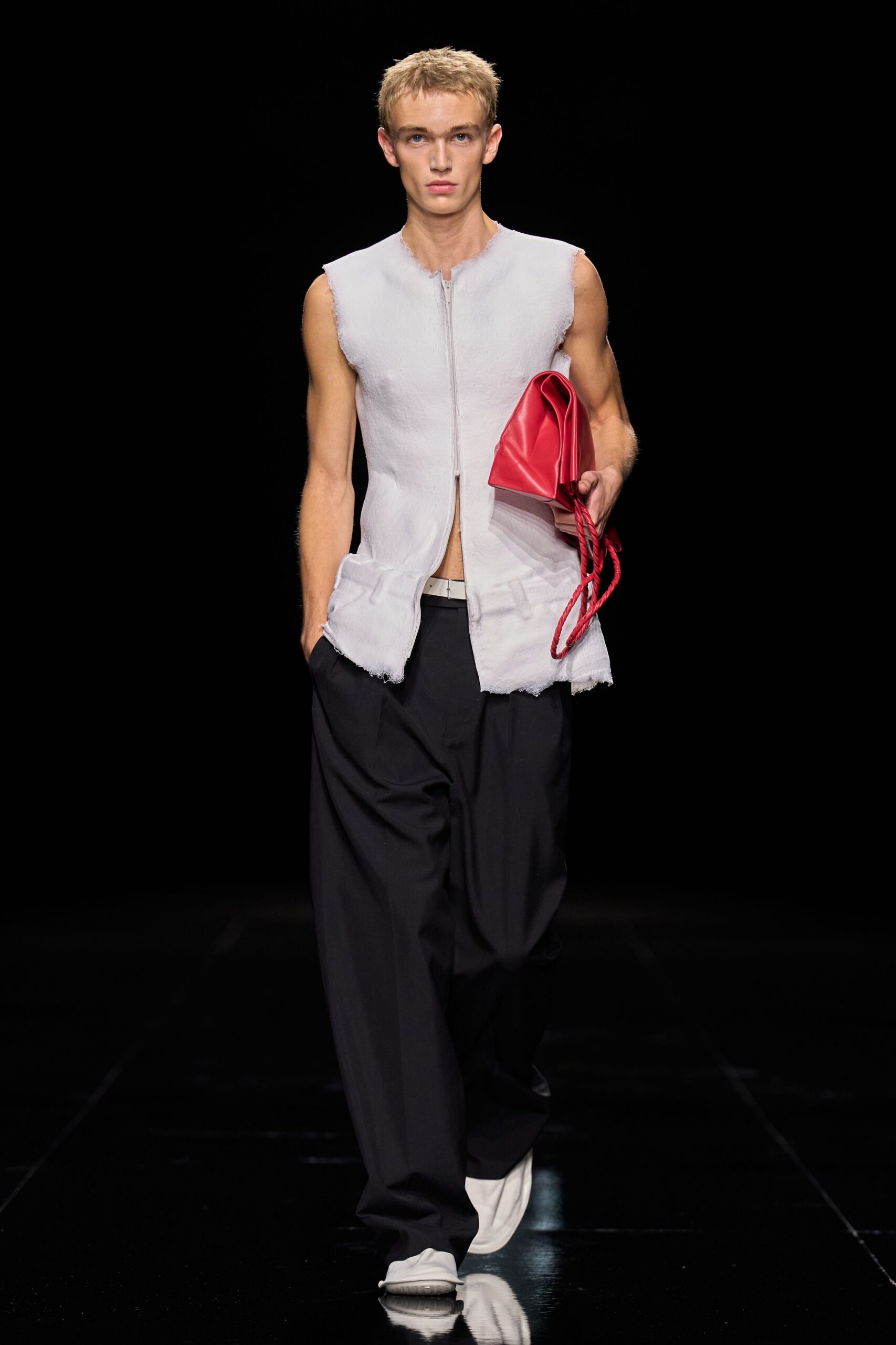 raw-edge sleeveless zip-front top