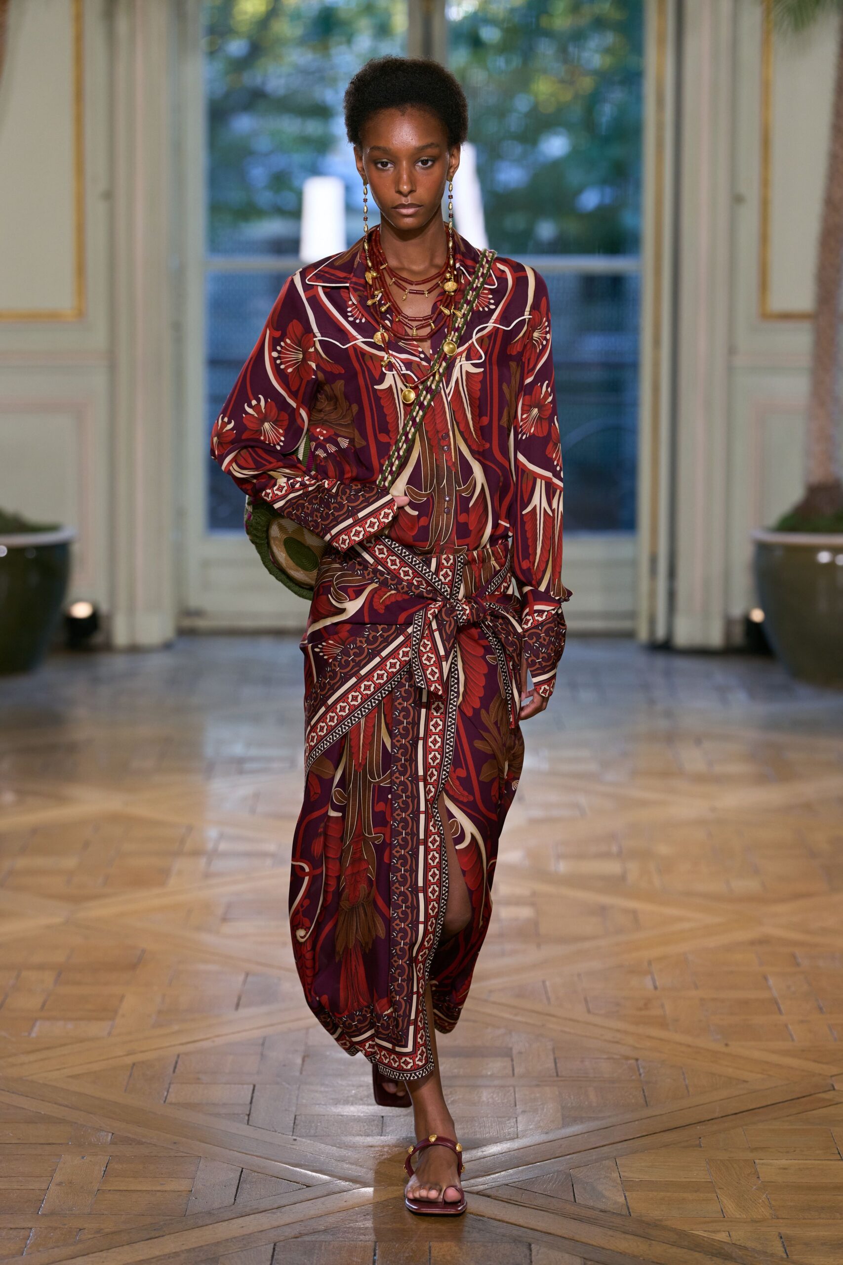 red silk long-sleeve collared relaxed printed belted dress