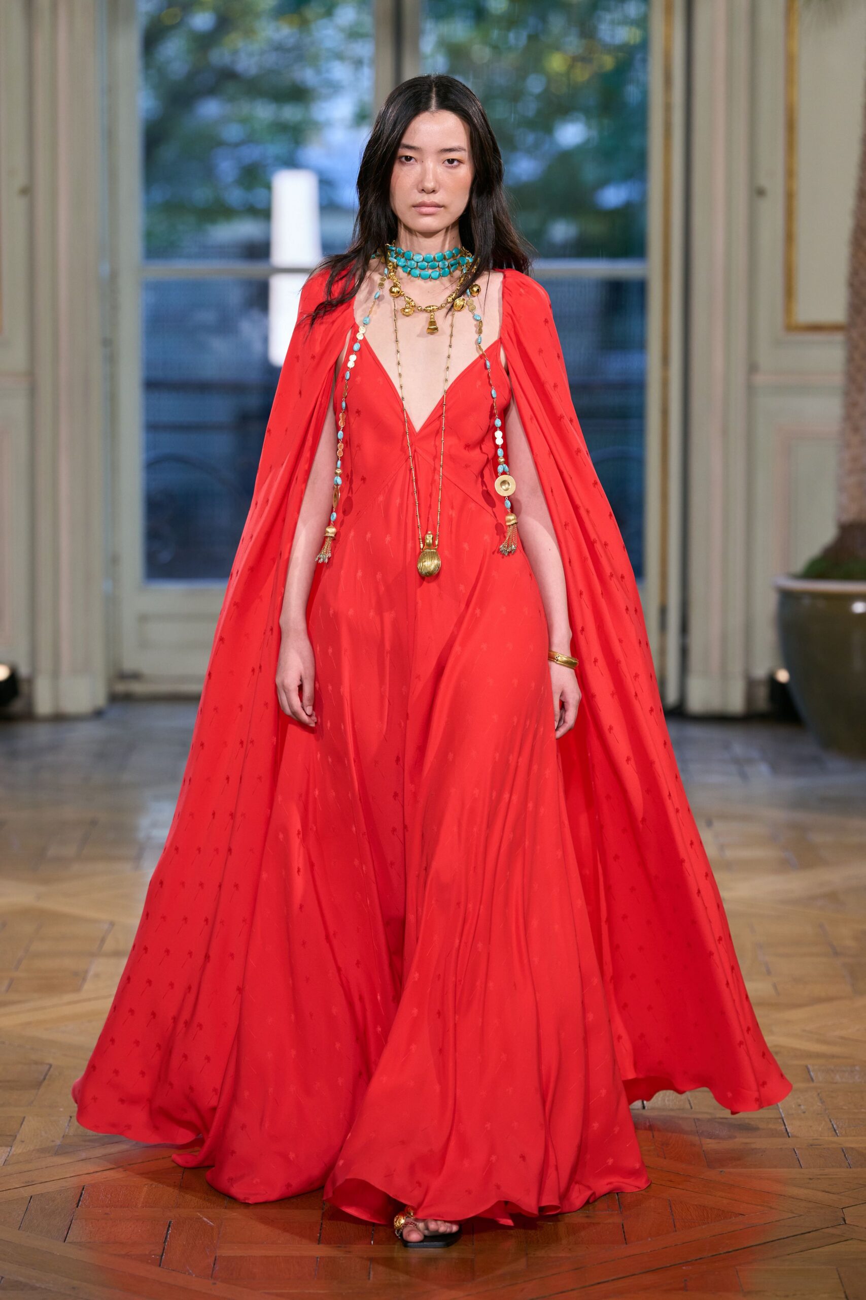 red cape-effect evening gown