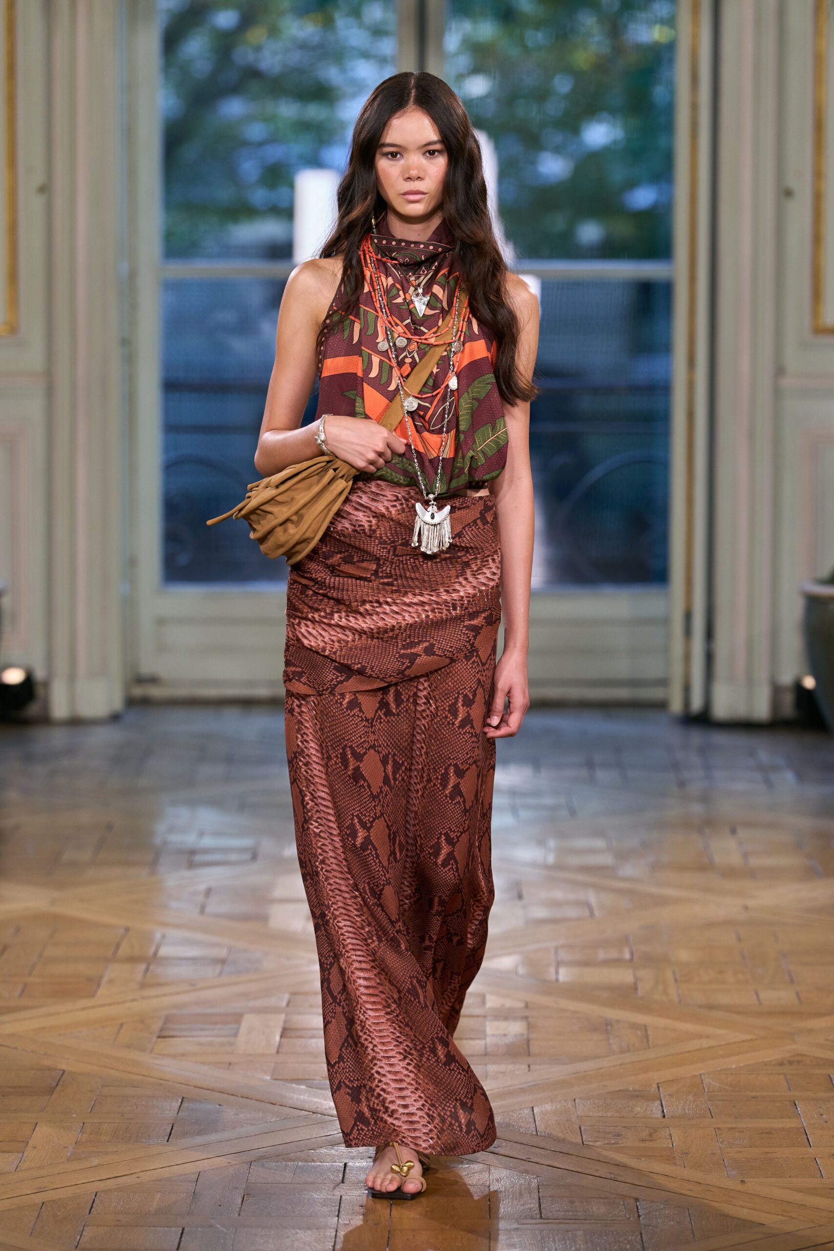 orange sleeveless high-neck printed cropped top