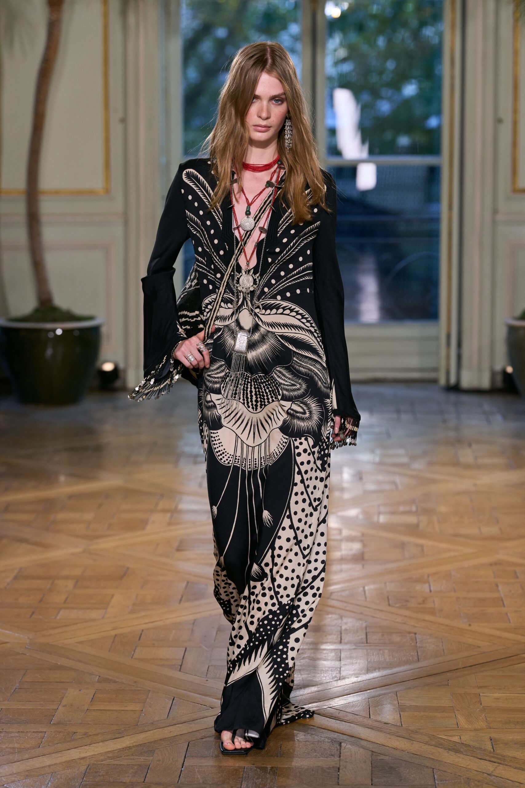 black long-sleeve collared printed flowing maxi gown