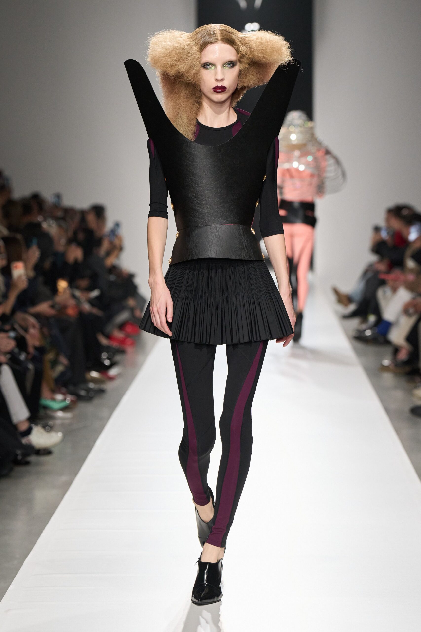 sculptural black peplum mini dress