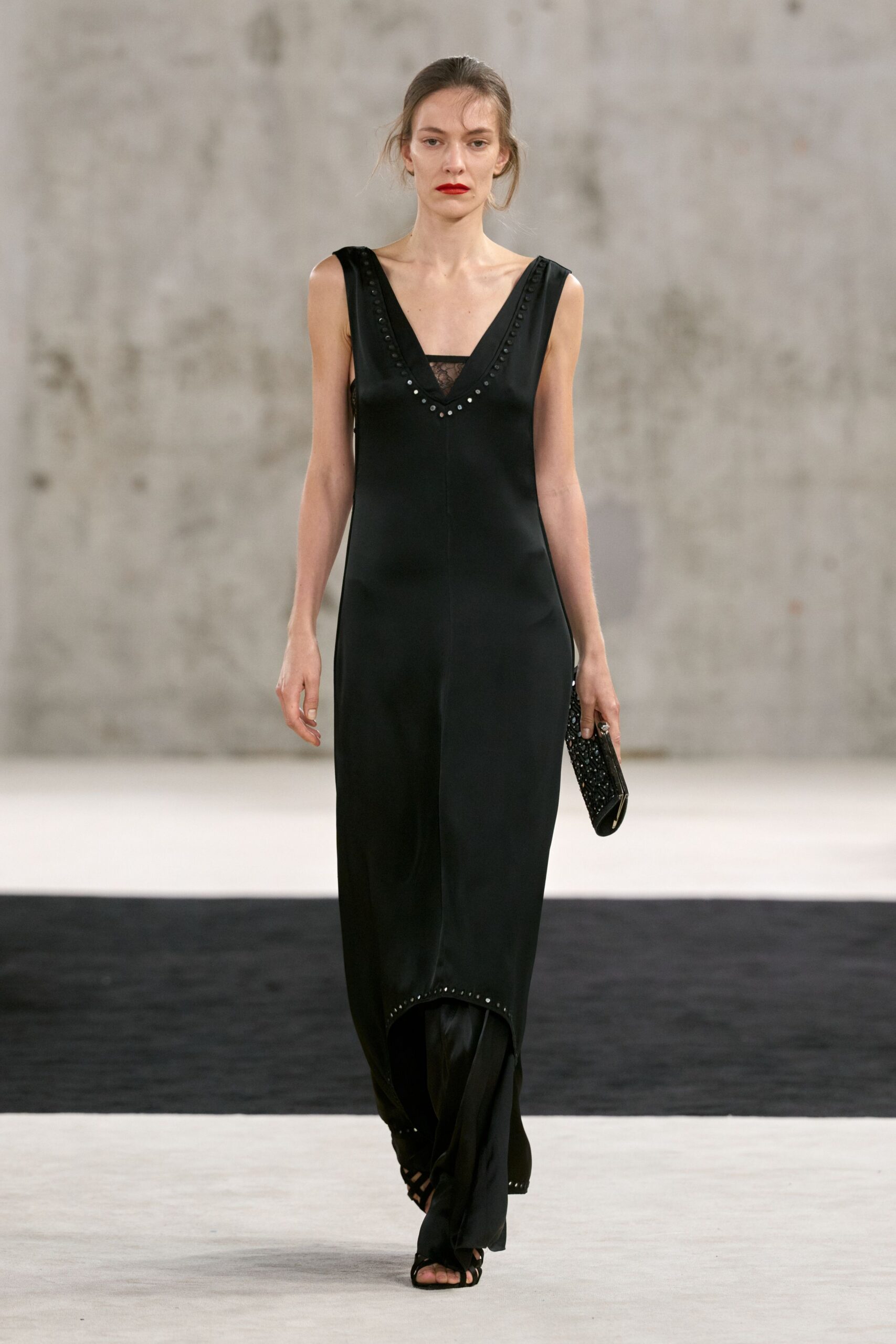 black studded V-neck evening gown