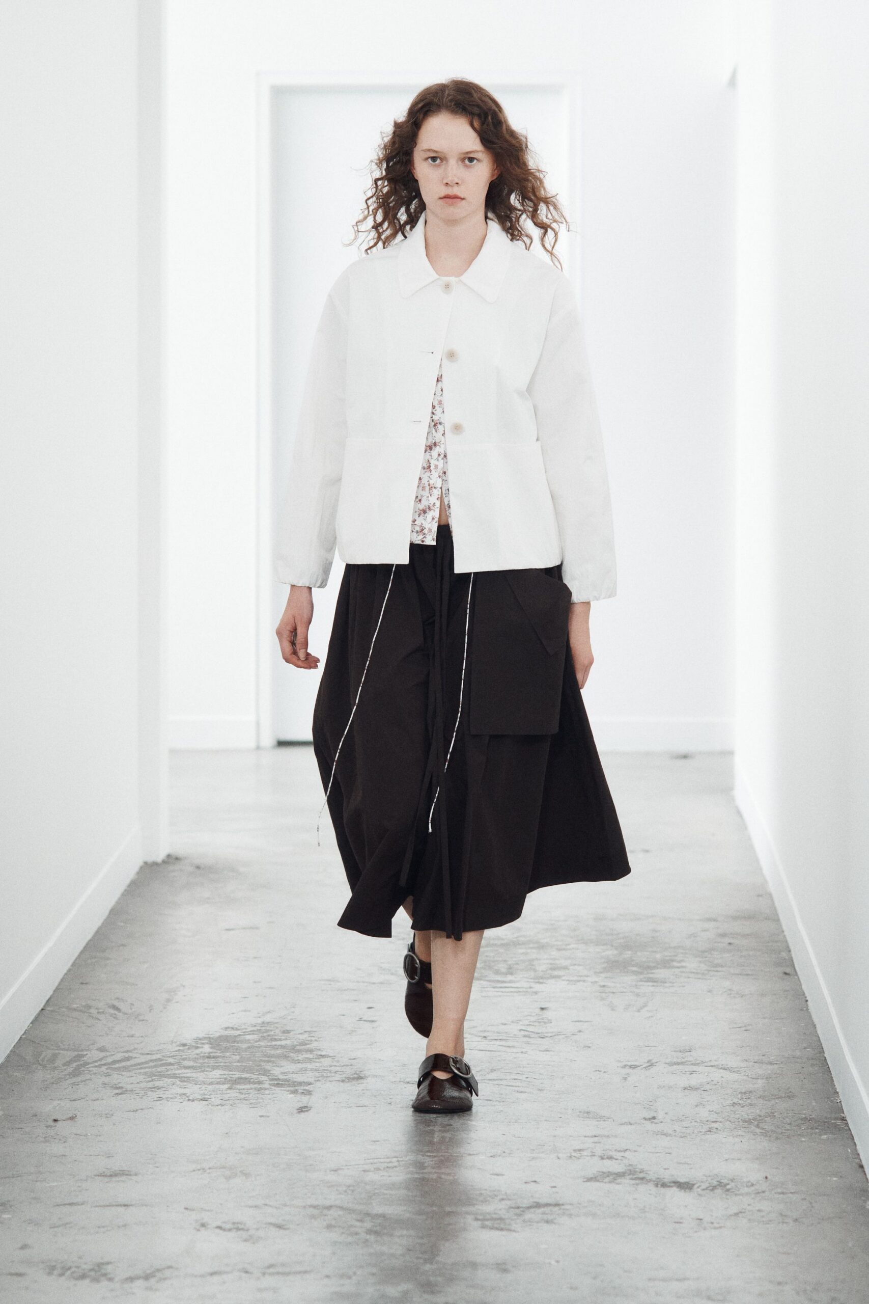white collared long-sleeve buttoned jacket