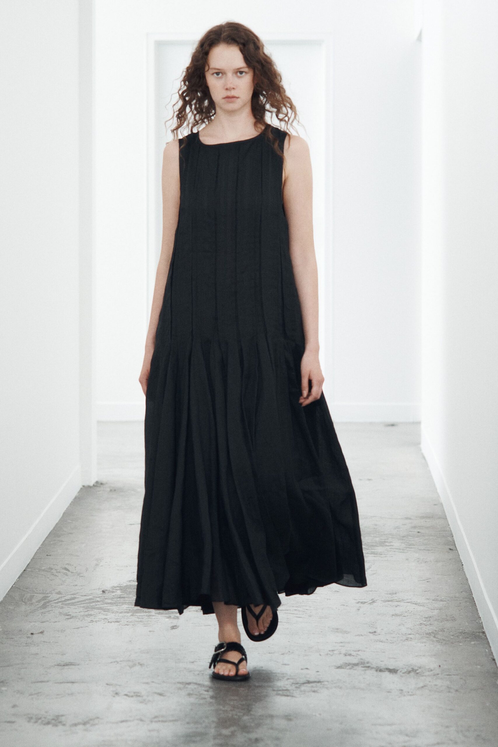 black pleated tiered maxi dress