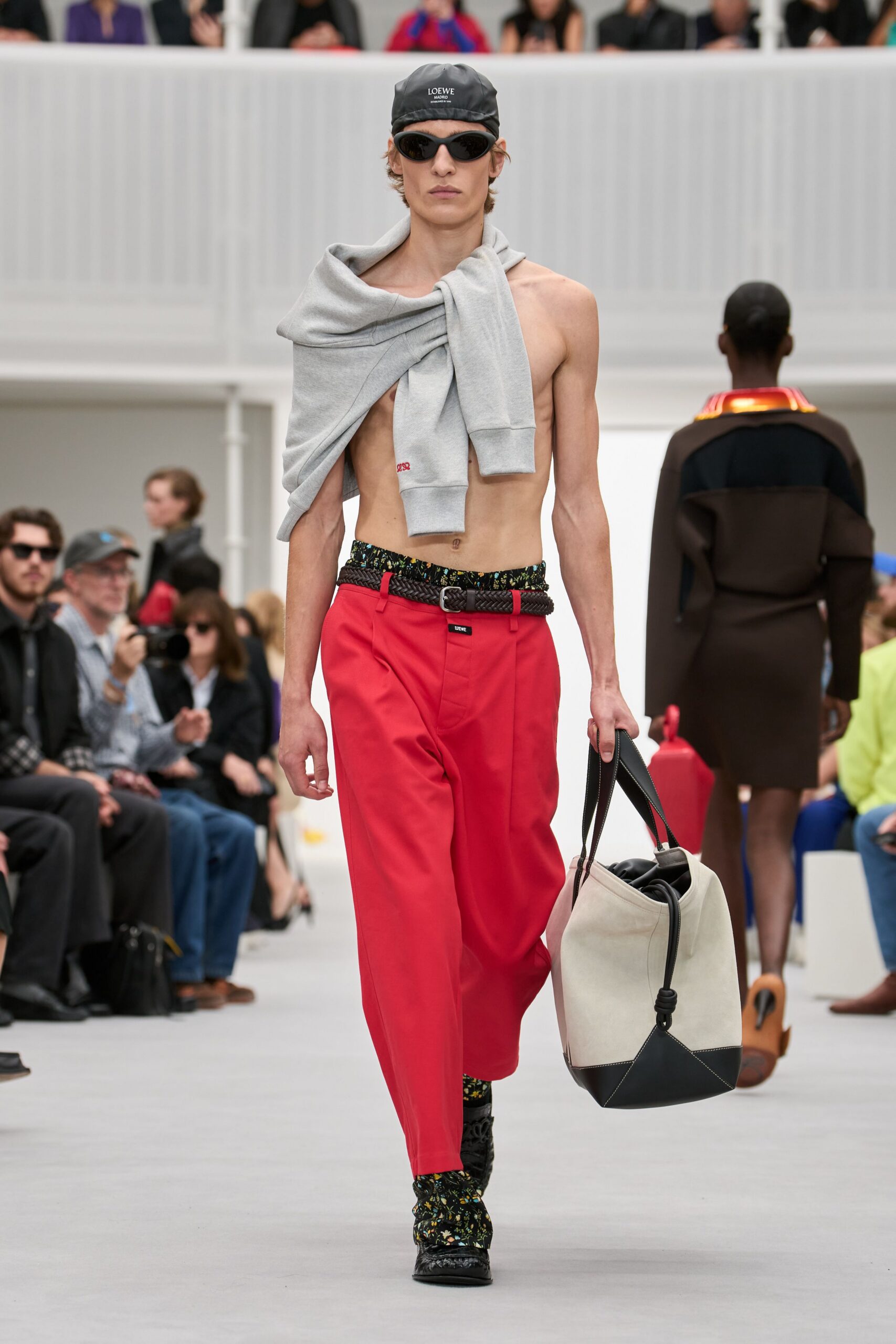 gray sweater wrapped across bare torso