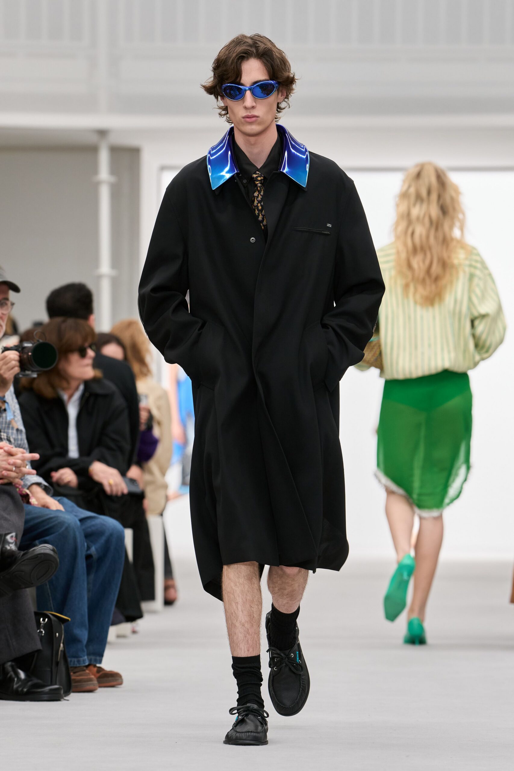 black coat with iridescent blue collar