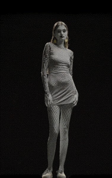 Pale ruched mini dress with one long sleeve and a drawn-in hip. Sheer pale tights, slightly cloudy over the knees. White platform Mary Janes with a blunt rounded toe. Under strip-mall parking lot lights after the recital let out.