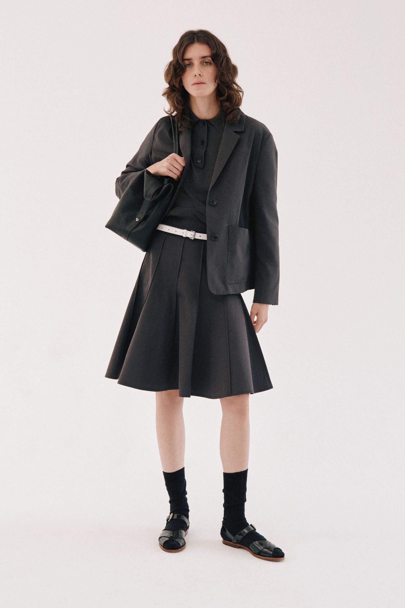 black pleated mini skirt