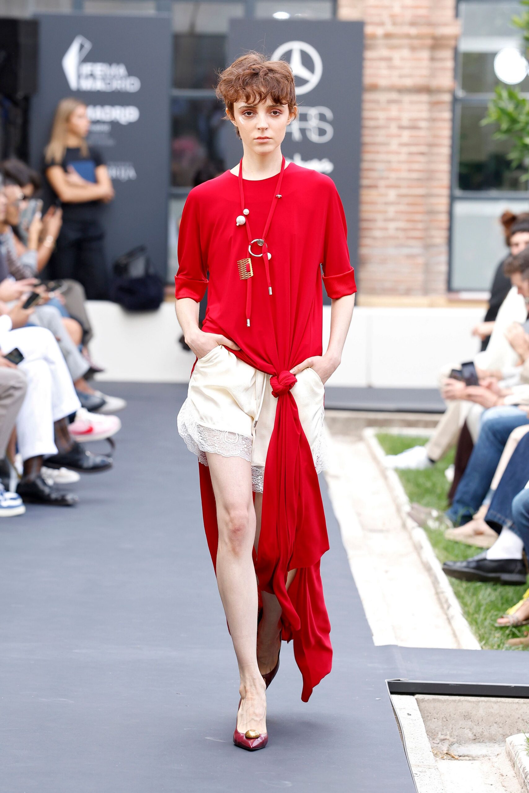 red draped knot-front top