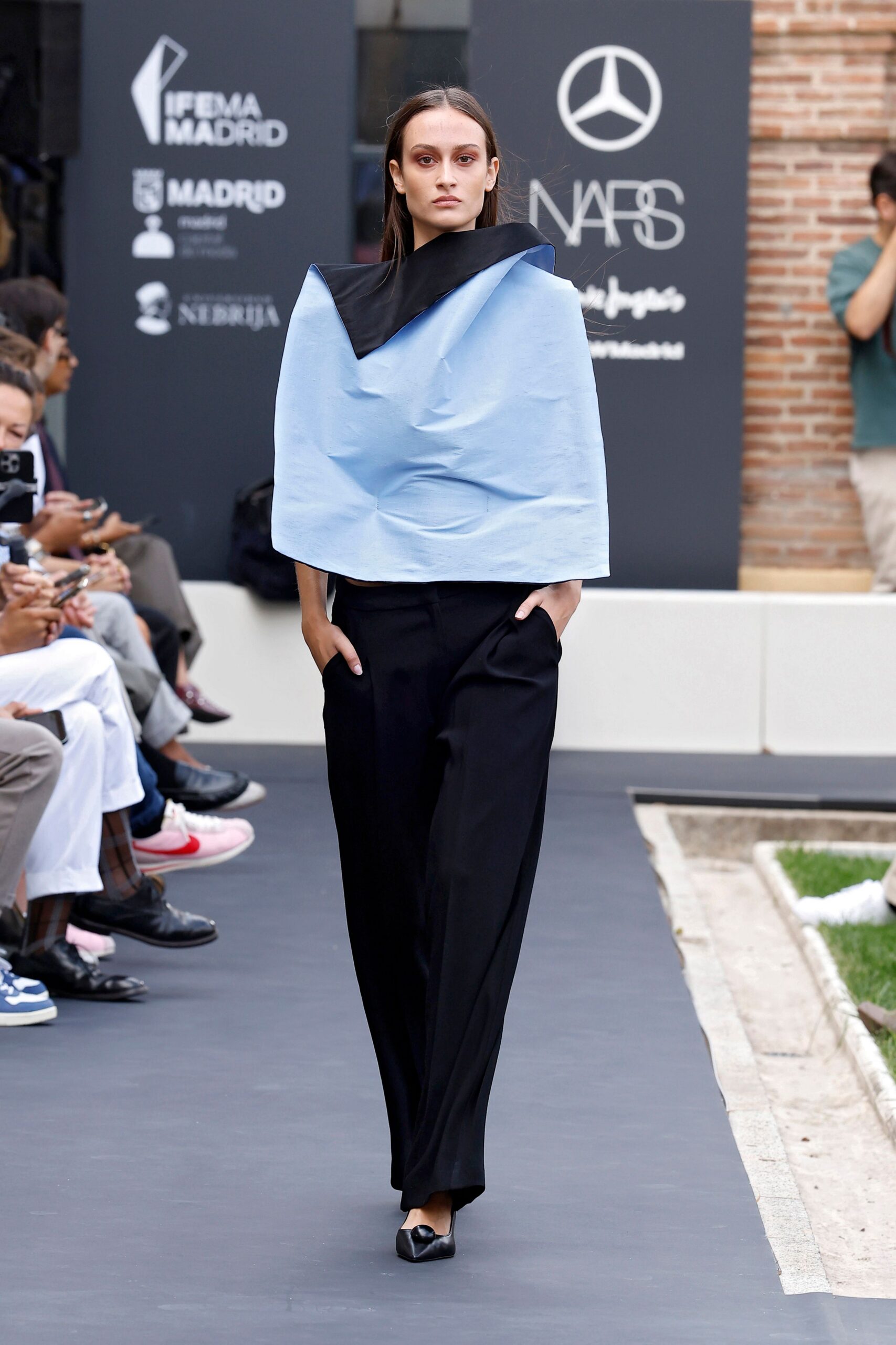 sculptural asymmetric blue top