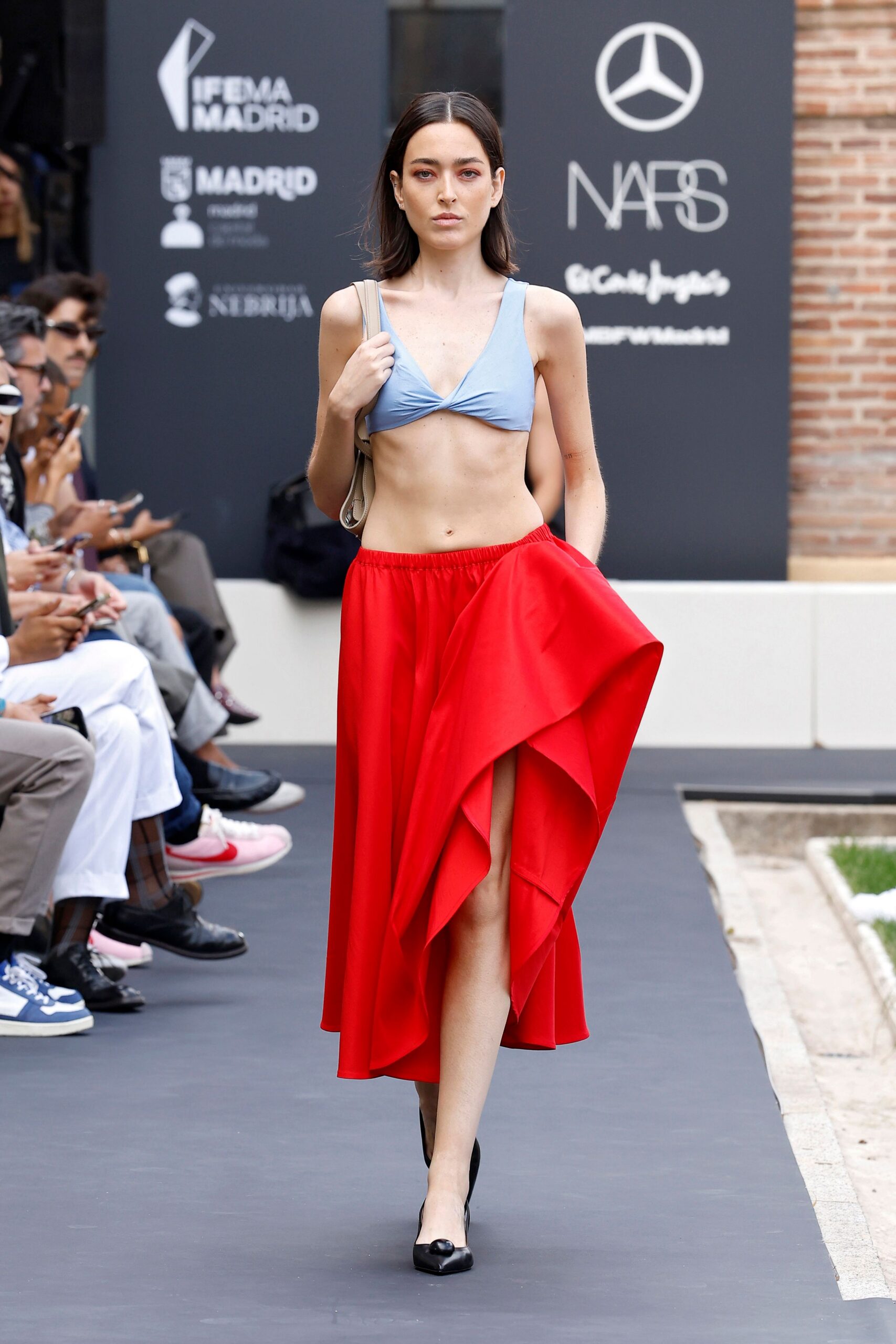 red draped sarong-style maxi skirt