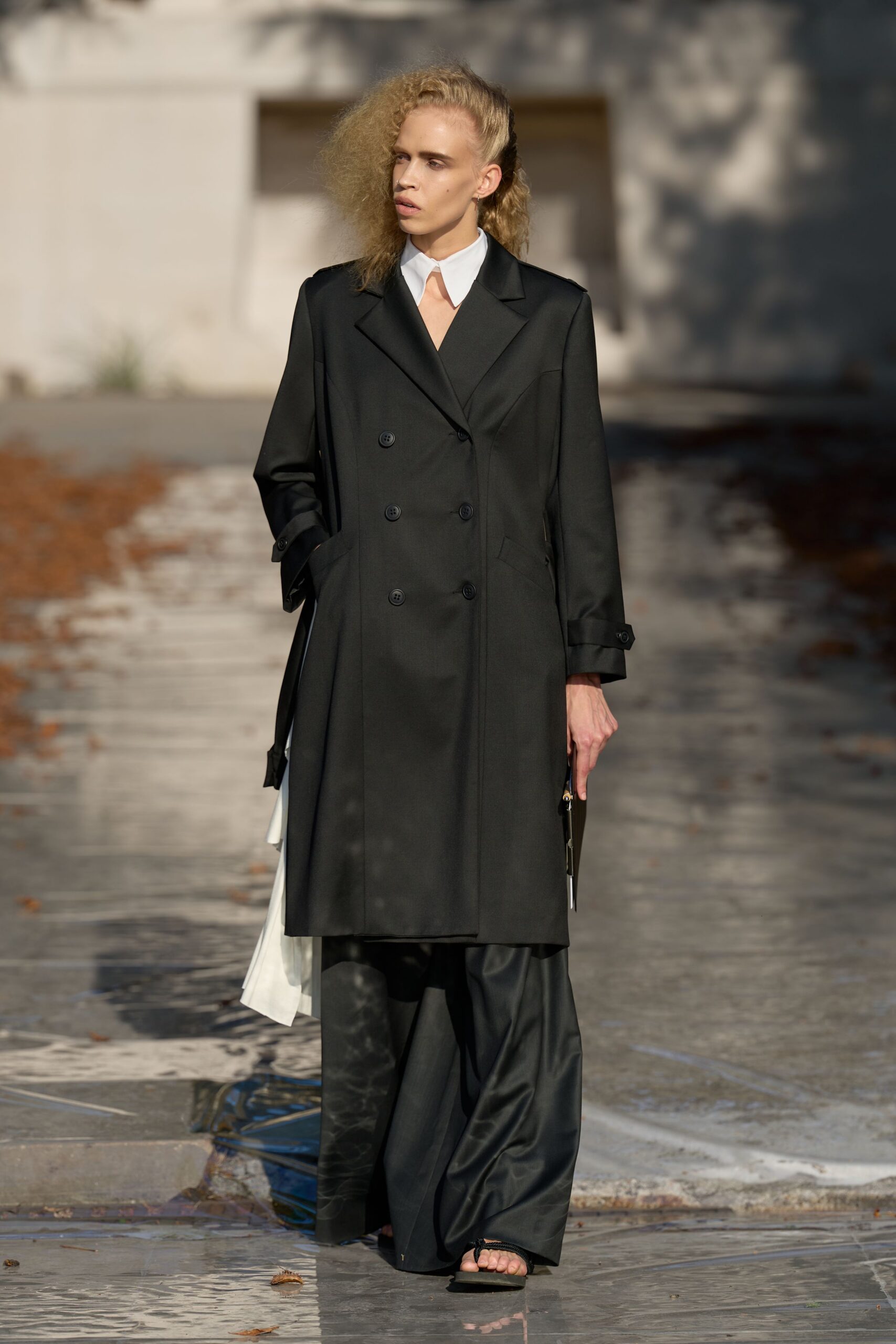 black double-breasted trench coat