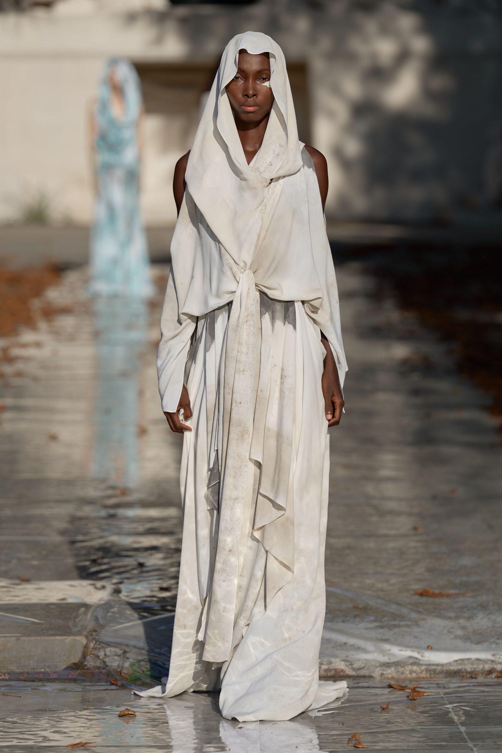 hooded draped ivory evening gown