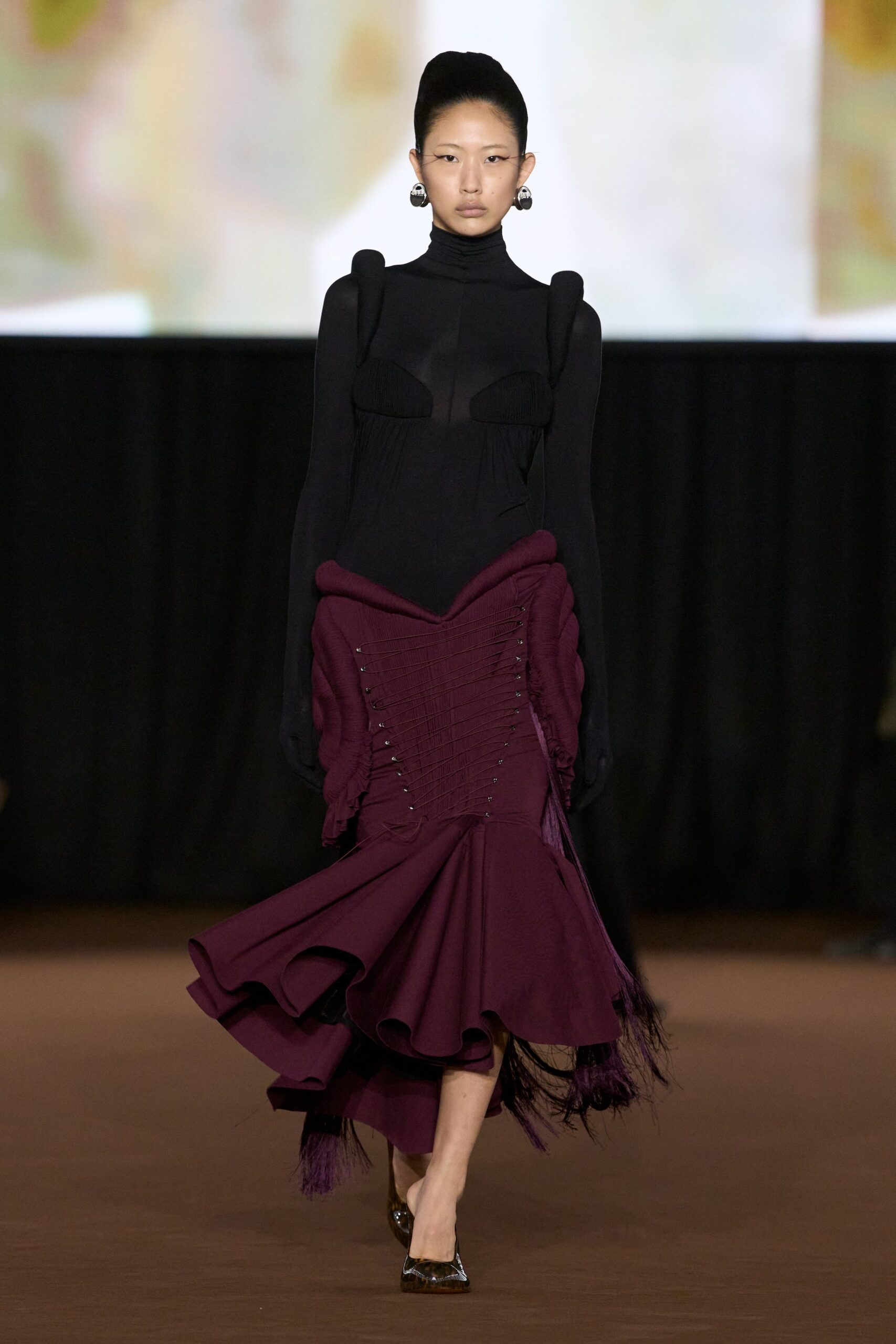 black long-sleeve turtleneck fitted ruched flared midi dress